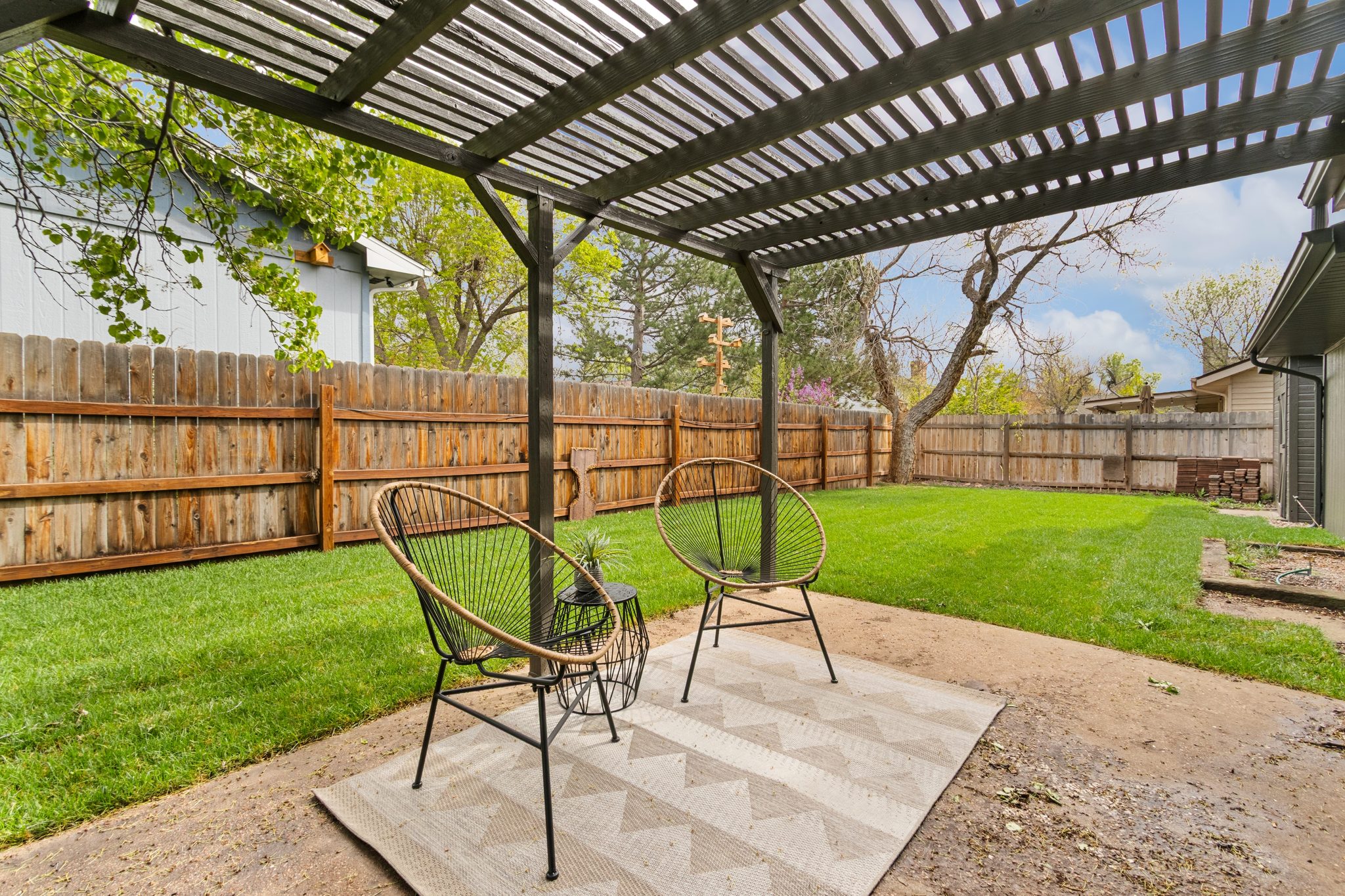 Another view of the pergola patio and the back of the house