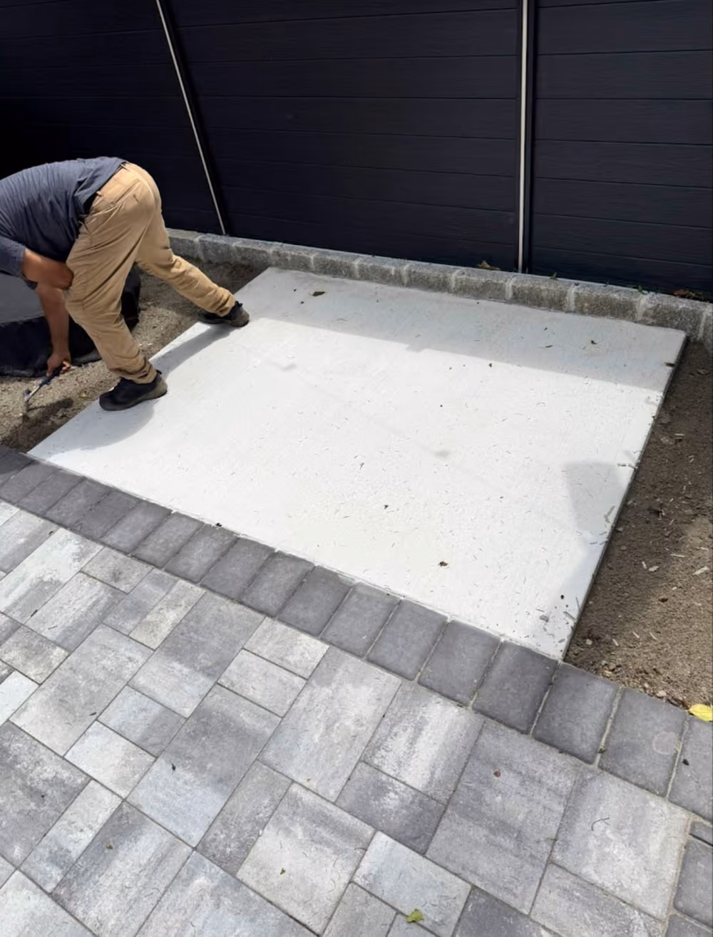 Black Composite Fence and Paver Patio Install in Newark NJ