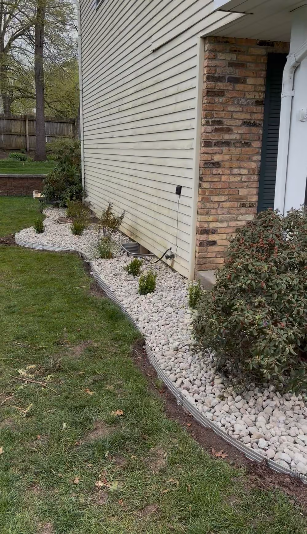 Transformative Portage Oasis: G&D Landscape's Premier Lawn Renovation and Design Expertise