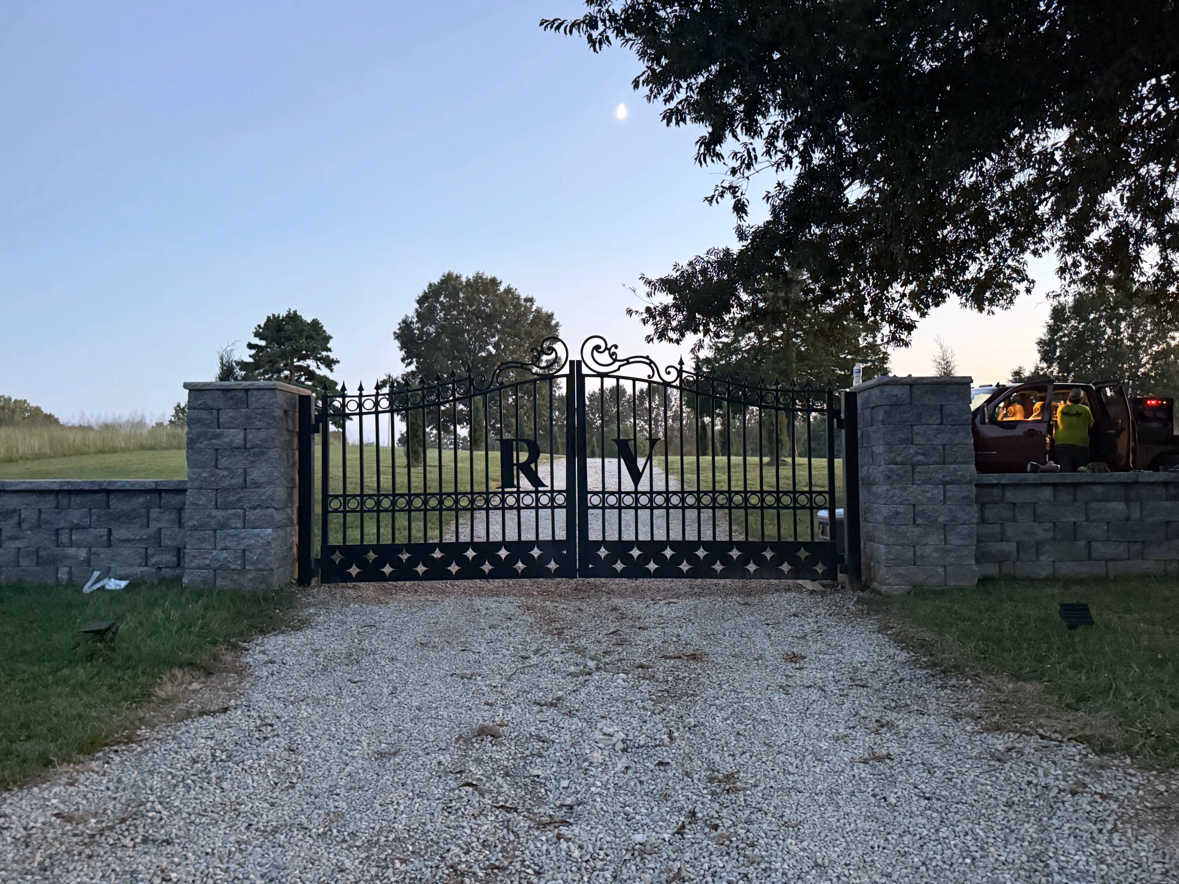 Custom Double Swing Iron Gate with Solar-Powered Electric Motors