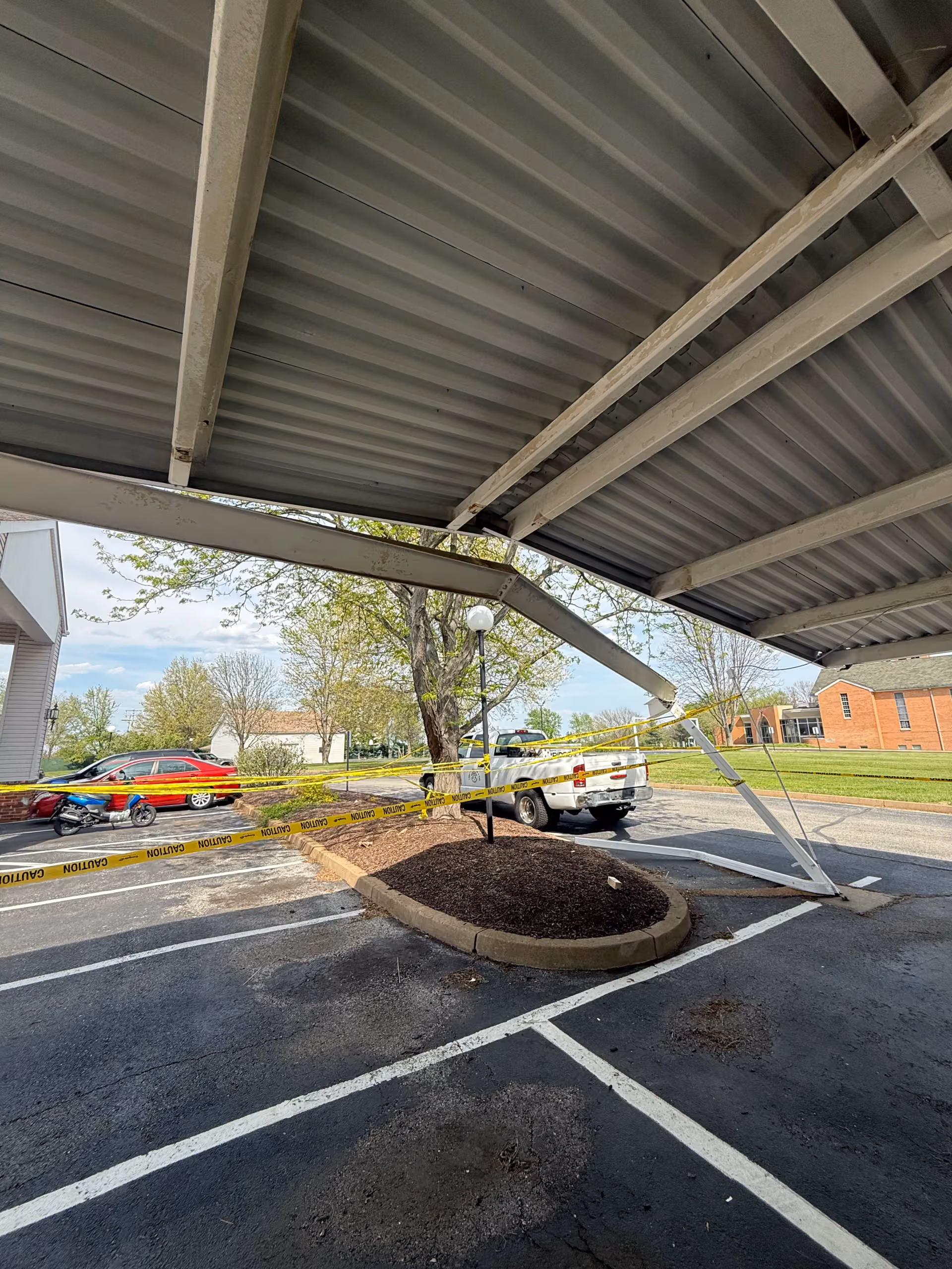 Steel Parking Cover Restored After Heavy Impact Damage