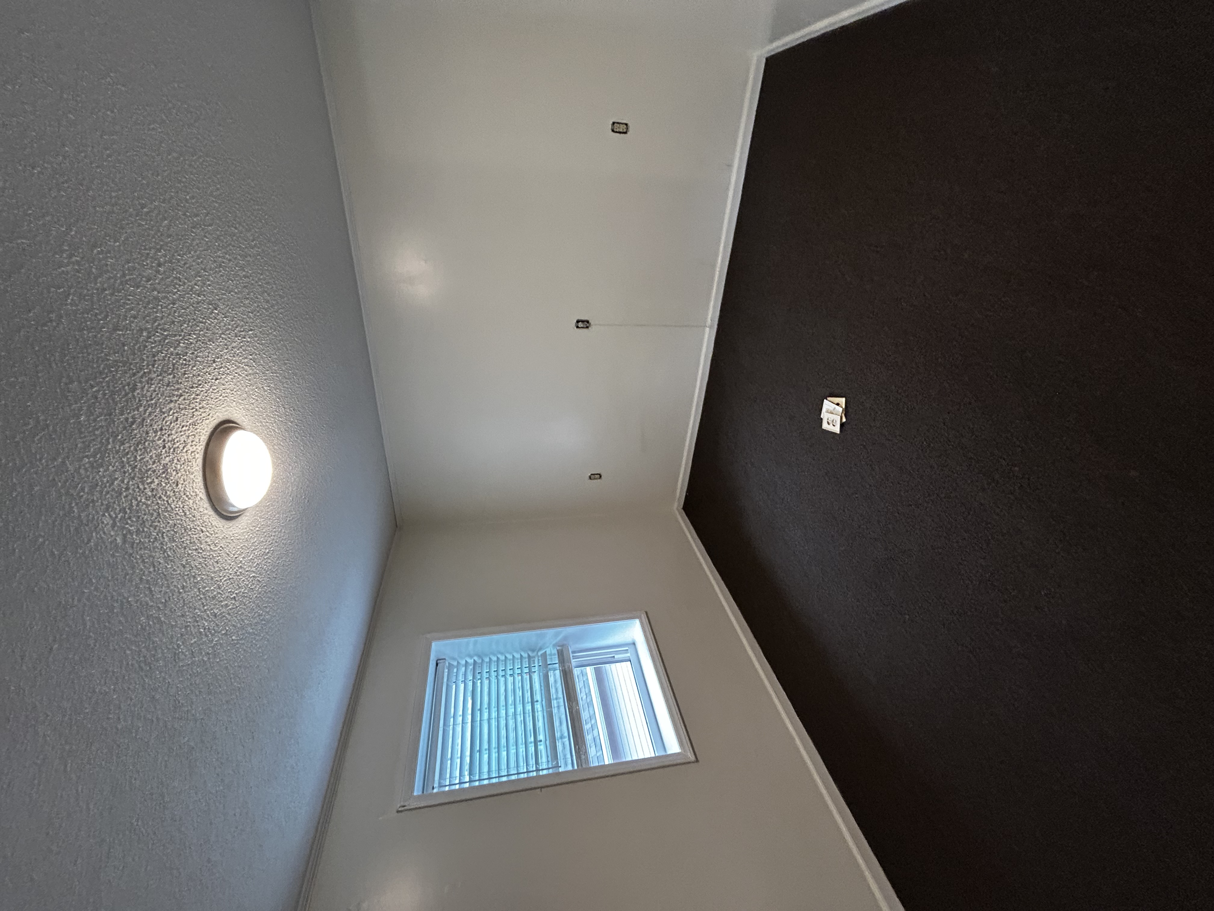 Interior stairwell before repaint