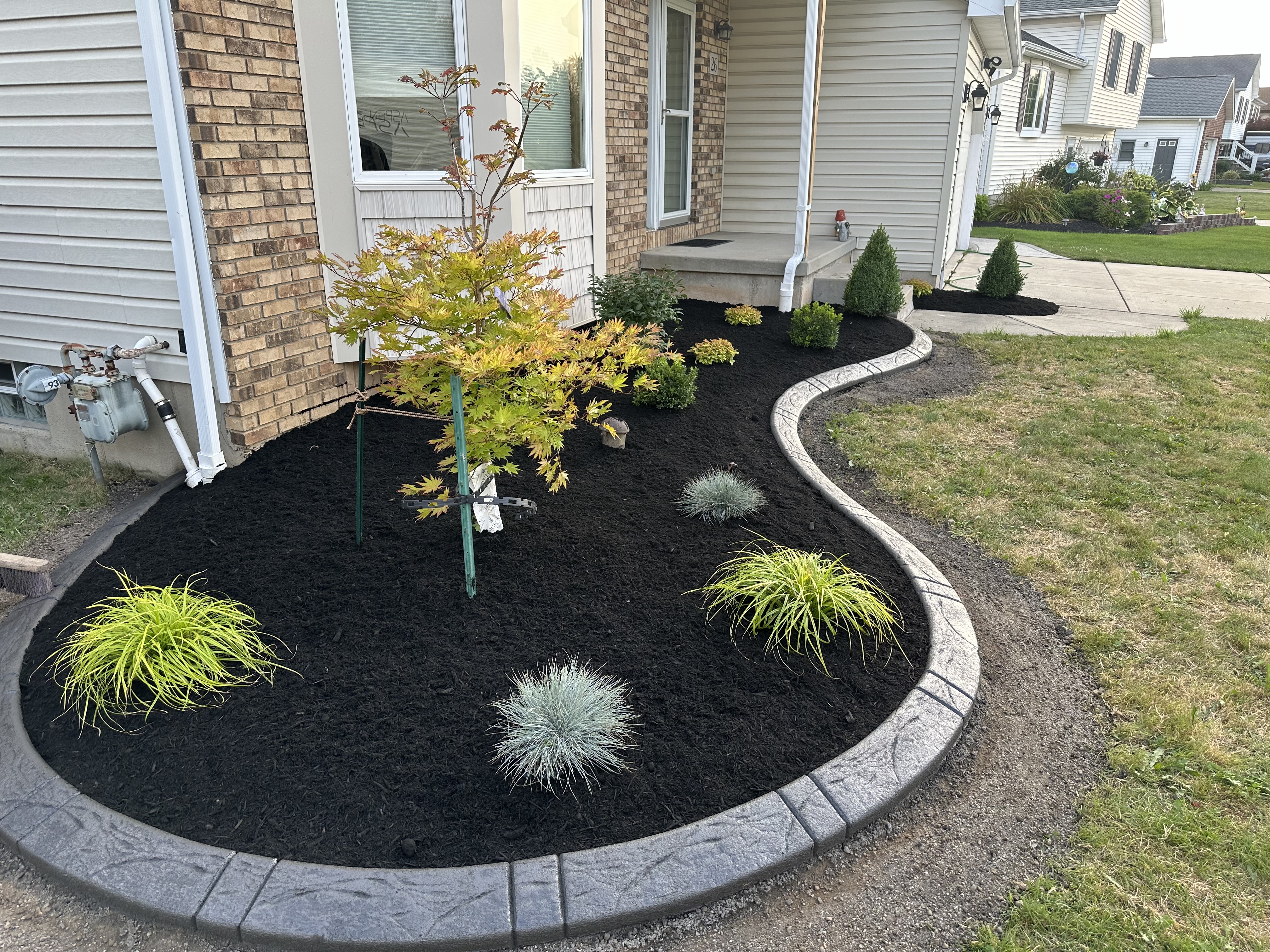Landscaping, Sod Installation, And Drainage Services company Hauser's Complete Care INC in Lancaster, NY