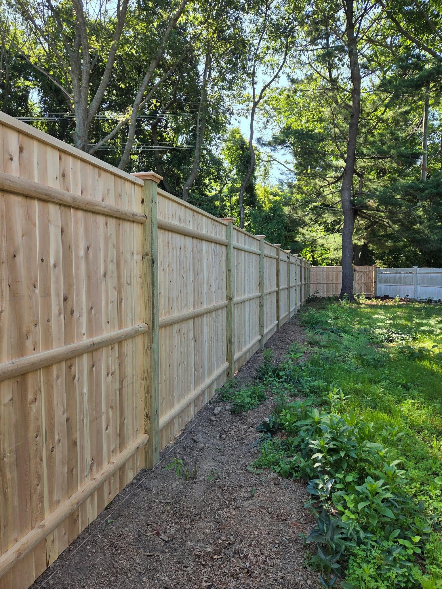 wood, chain-link, vinyl and aluminum fencing installation company Azorean Fence in Peabody, MA
