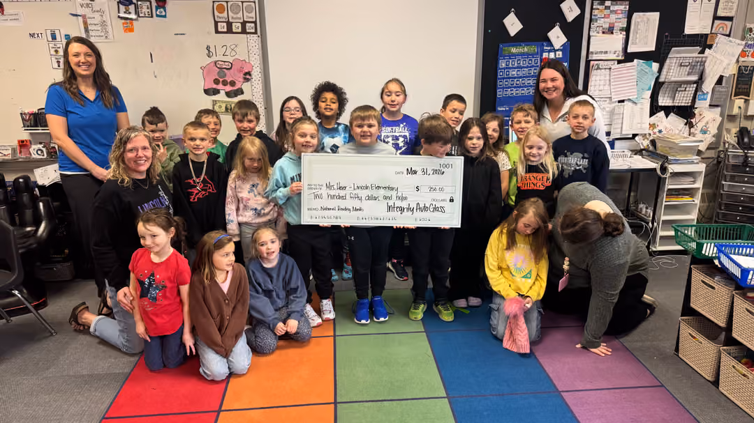 Integrity Auto Glass Donates $1,000 to Local Classrooms for Reading Month