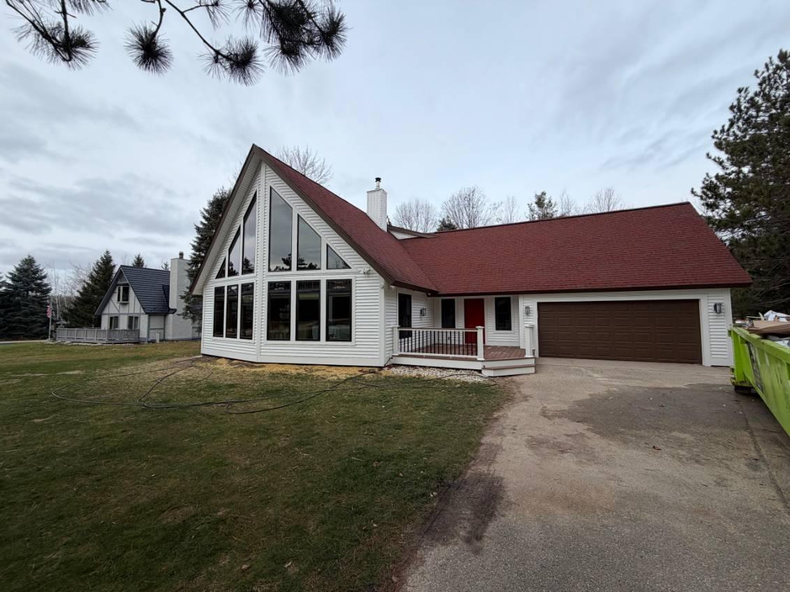  for Deluxe New World Painting Company  in Cheboygan, MI