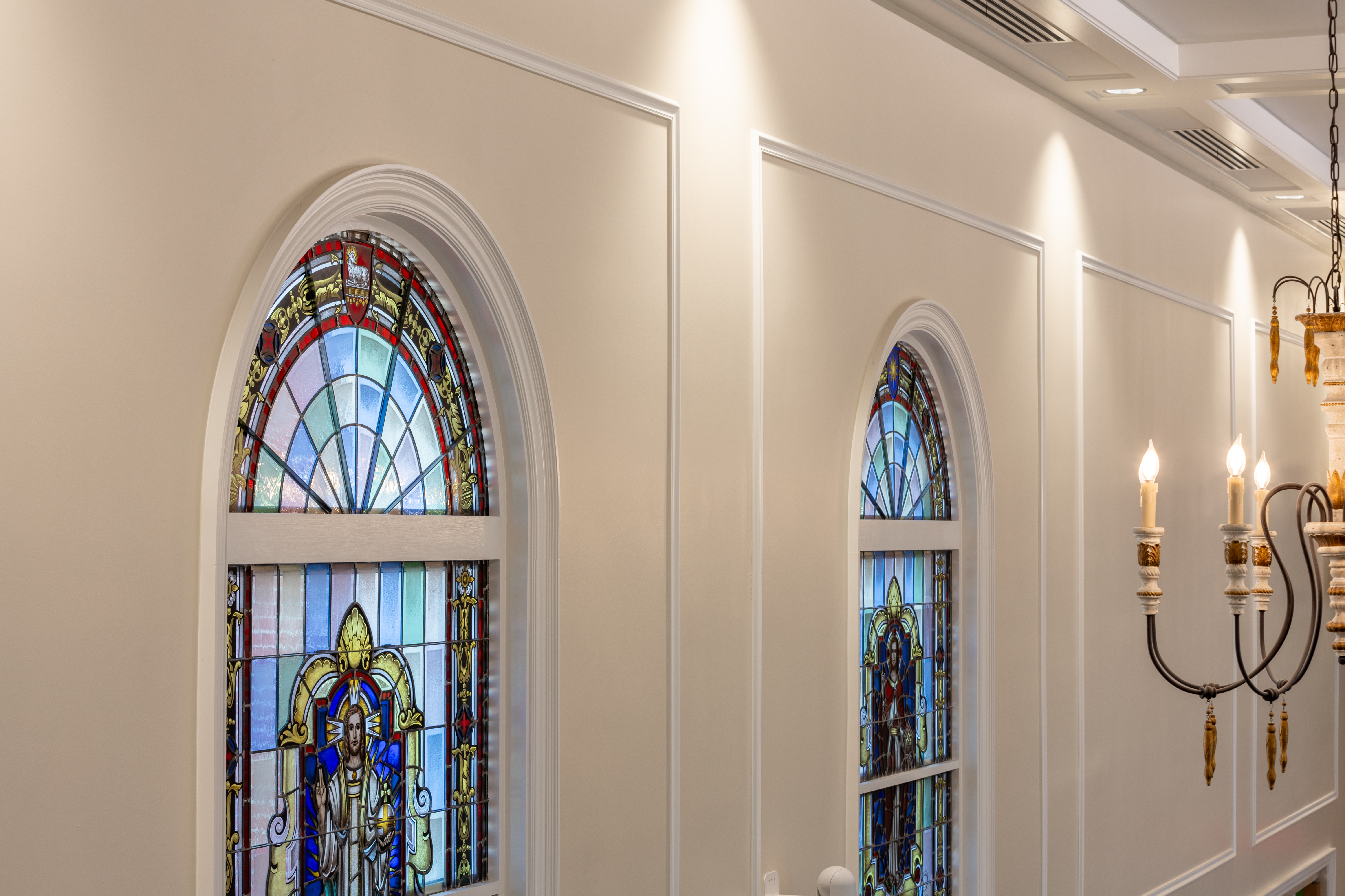 Restored church interior with custom trim and coffered ceiling