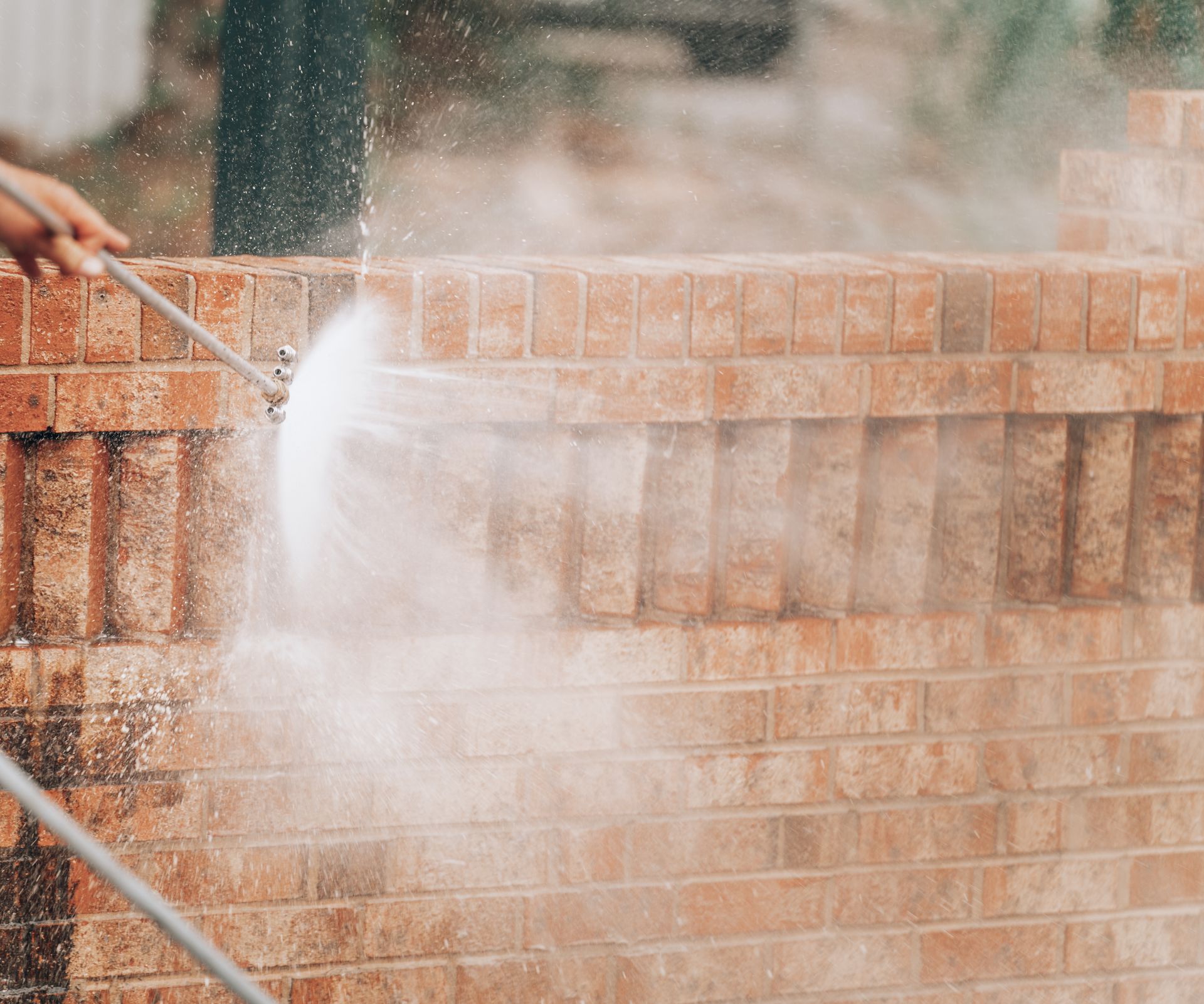 Pressure washing a driveway (hero photo)
