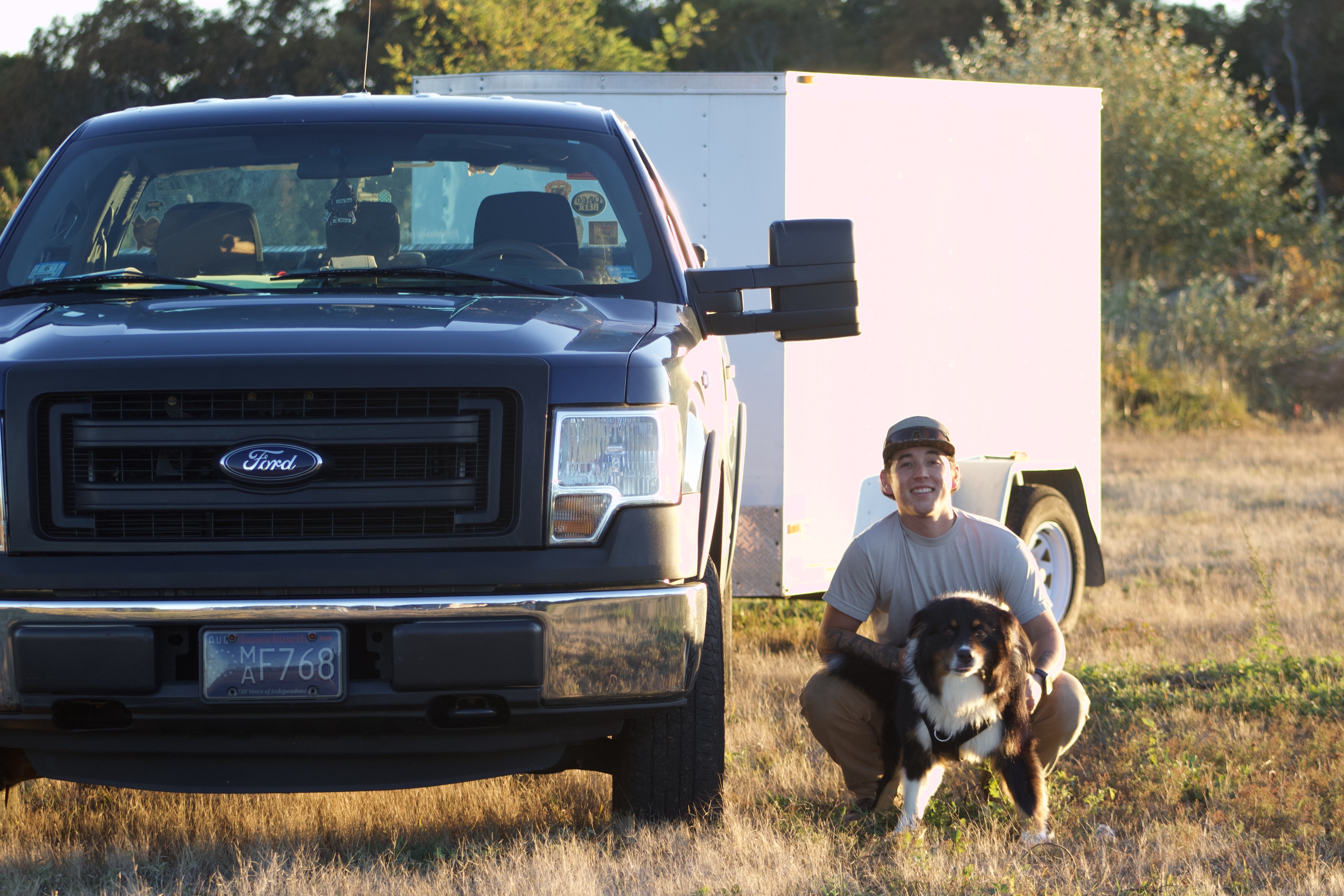 Karsten Becker of Becker Stone & Design with his dog and work truck