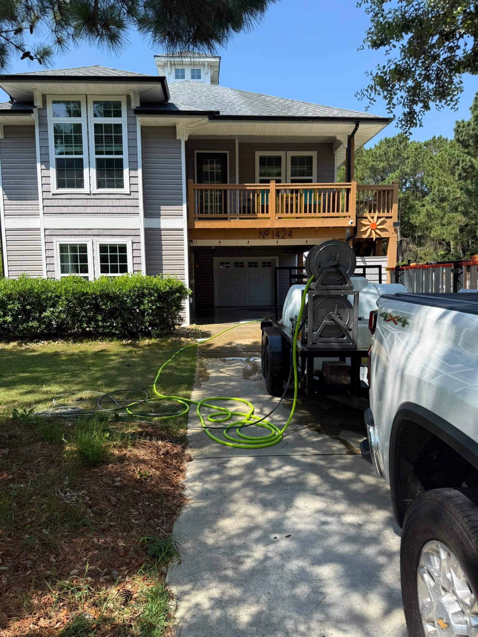 Gibson Clean OBX soft wash trailer on site at a Southern Shores, NC home