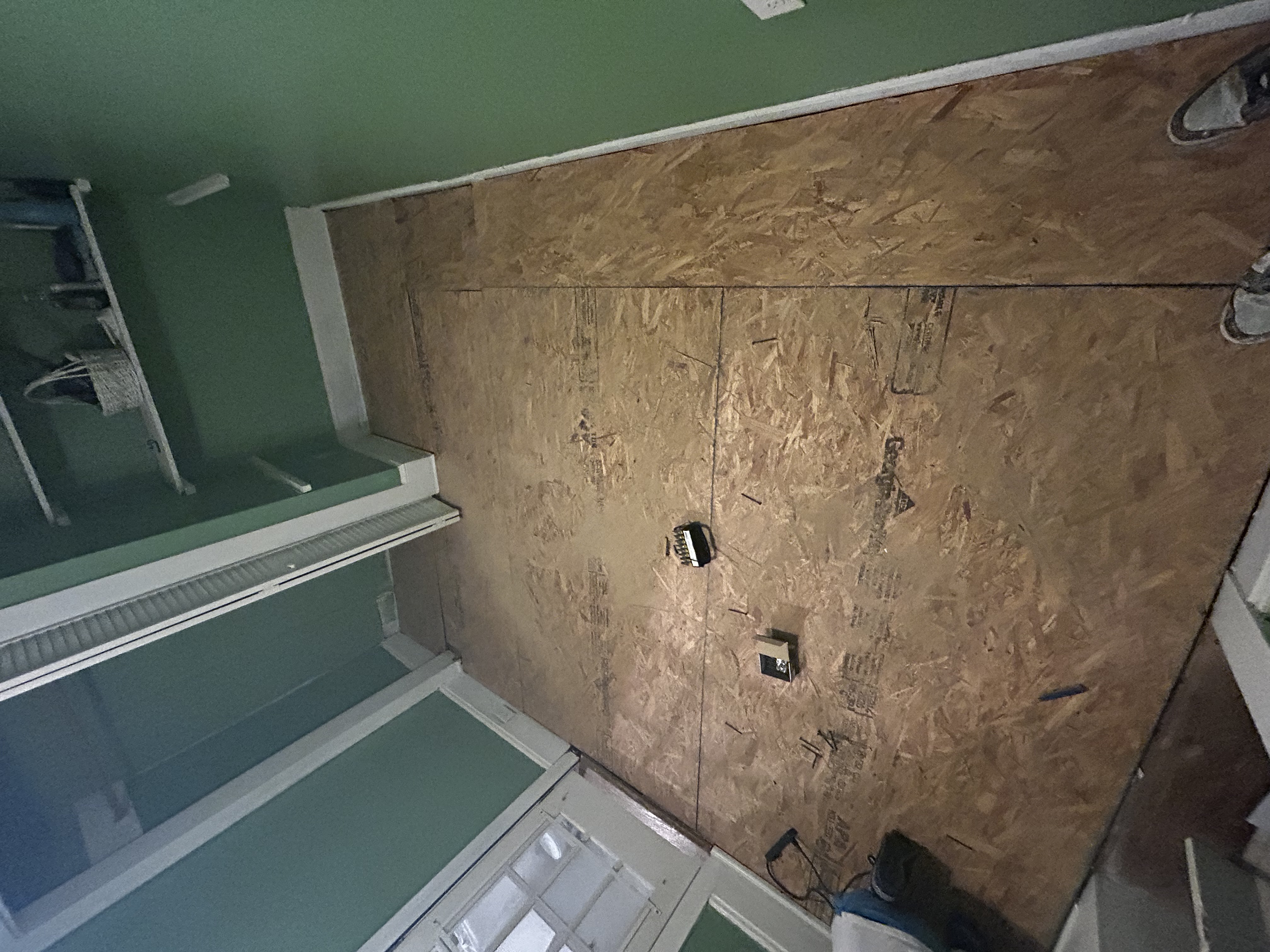 Room with bare subfloor before flooring