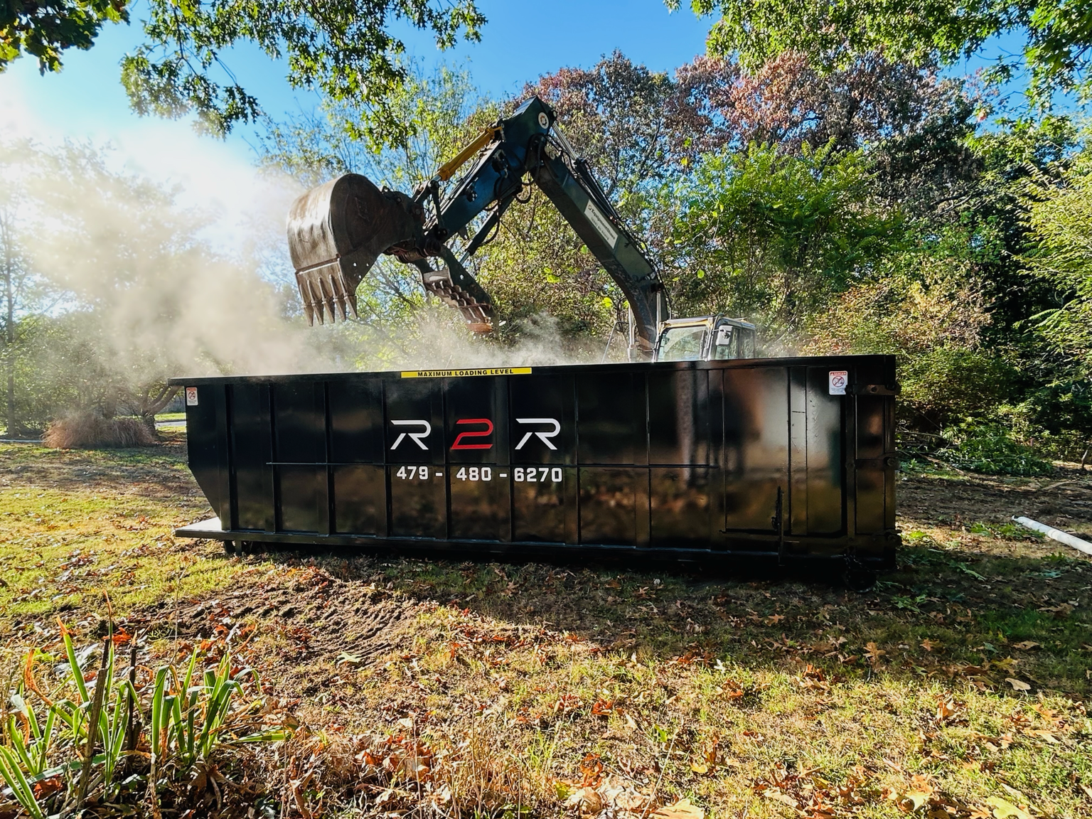 R2R roll-off dumpster placed at a commercial property in Northwest Arkansas