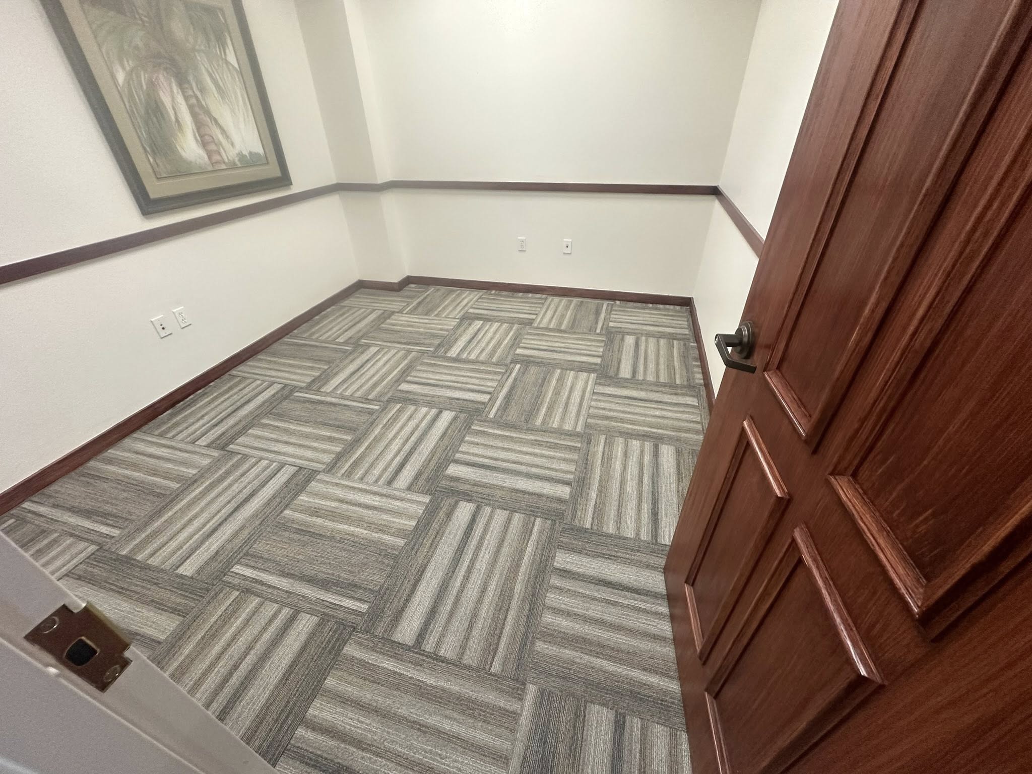 Office room in Tampa, FL with new grey commercial carpet tile