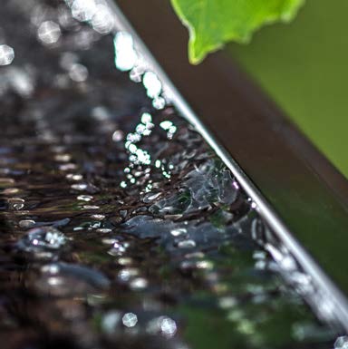Rollback+ elevated front curve redirecting water back into the gutter