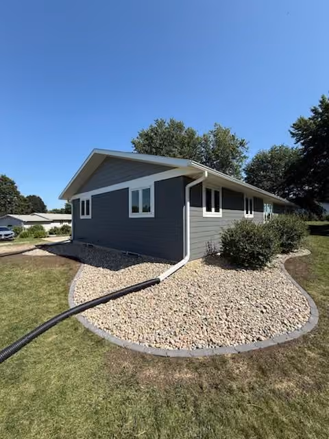Sioux Center Home Enhanced with Rock and Walkways