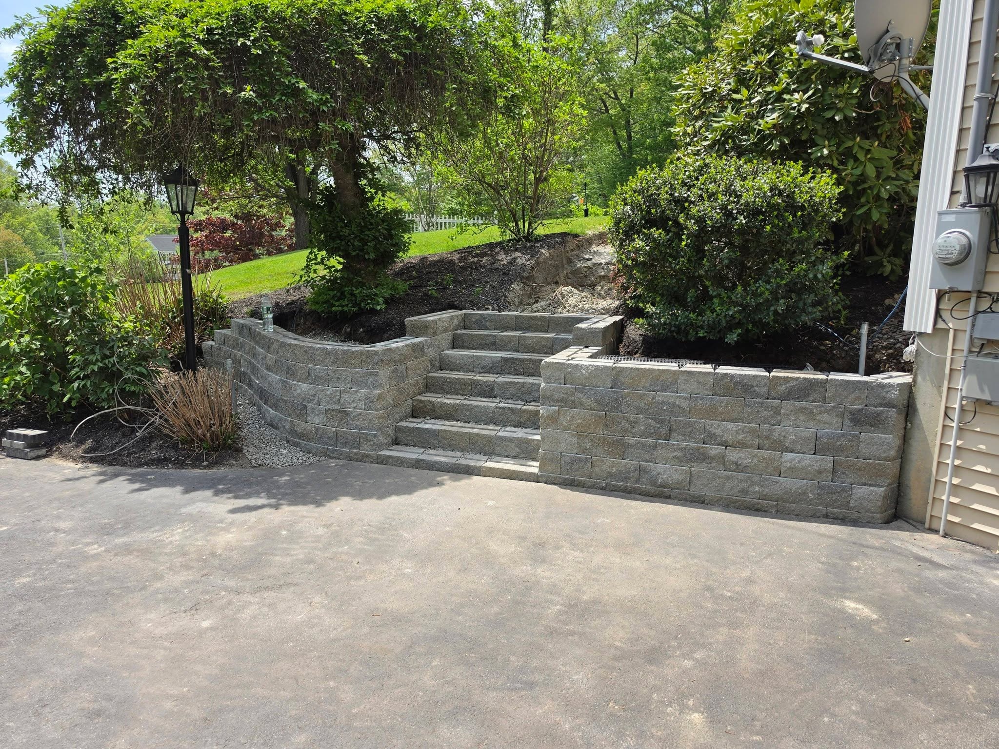 Block retaining wall construction