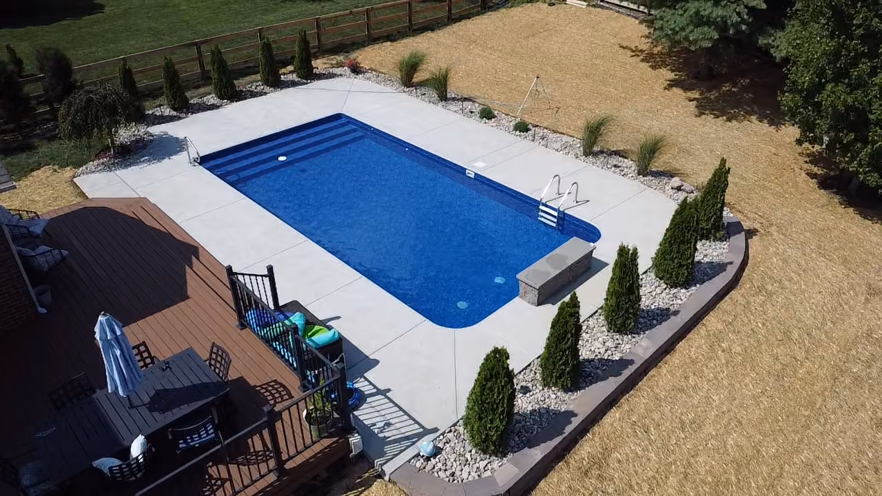 Backyard Paradise with Poolside Landscaping