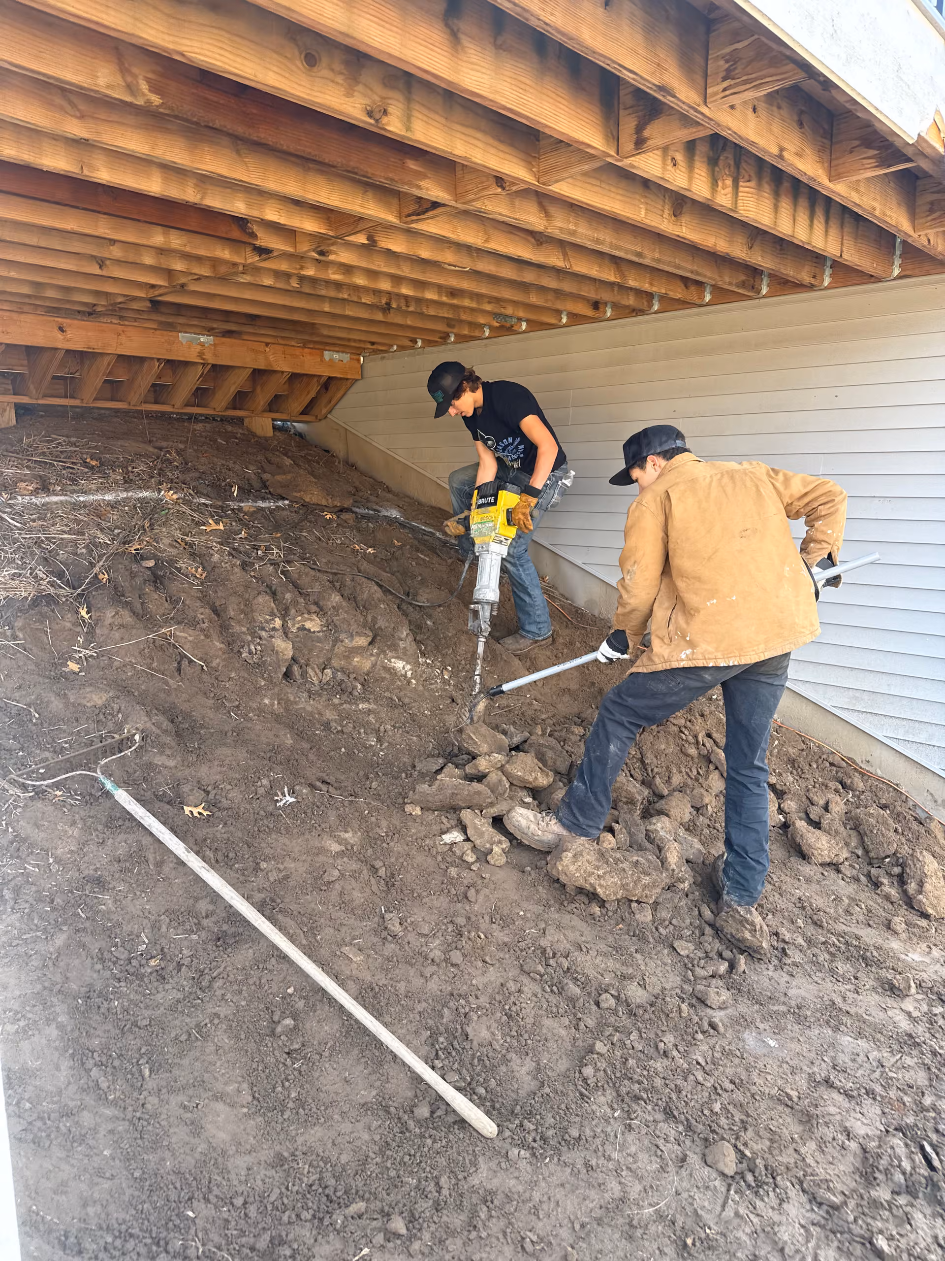 Boulder Wall Installation Under the Deck in Ham Lake