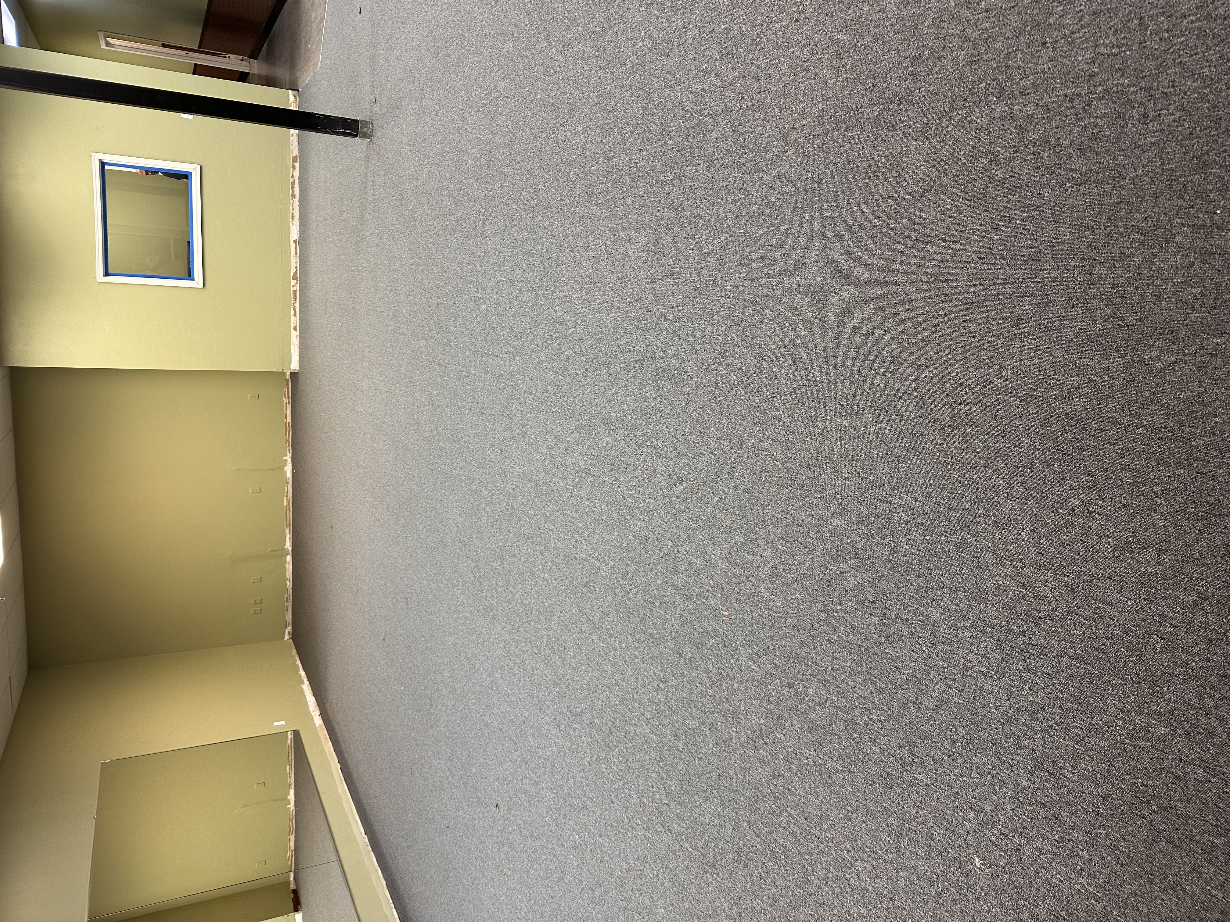 Commercial studio space in Tampa, FL with new grey commercial carpet