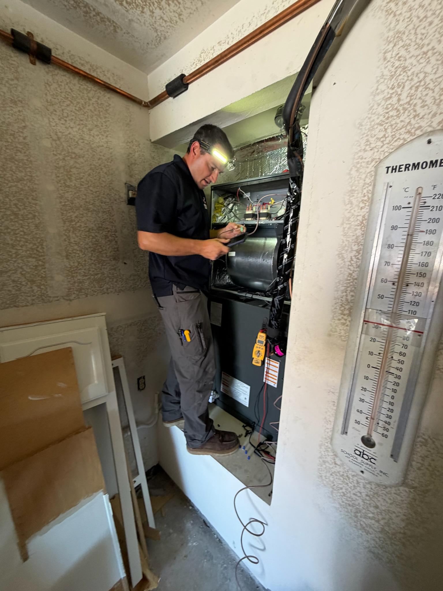 By The Book Plumbing, Heating and Air Conditioning technician on a job in San Diego, CA