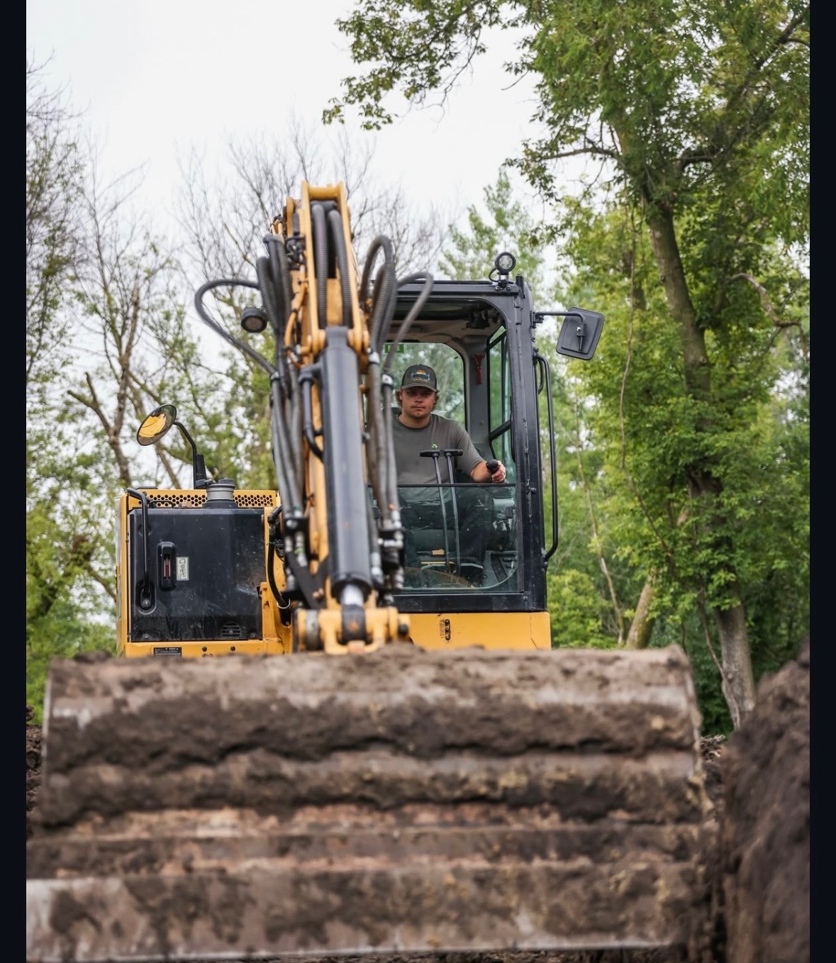 Blake running an excavator