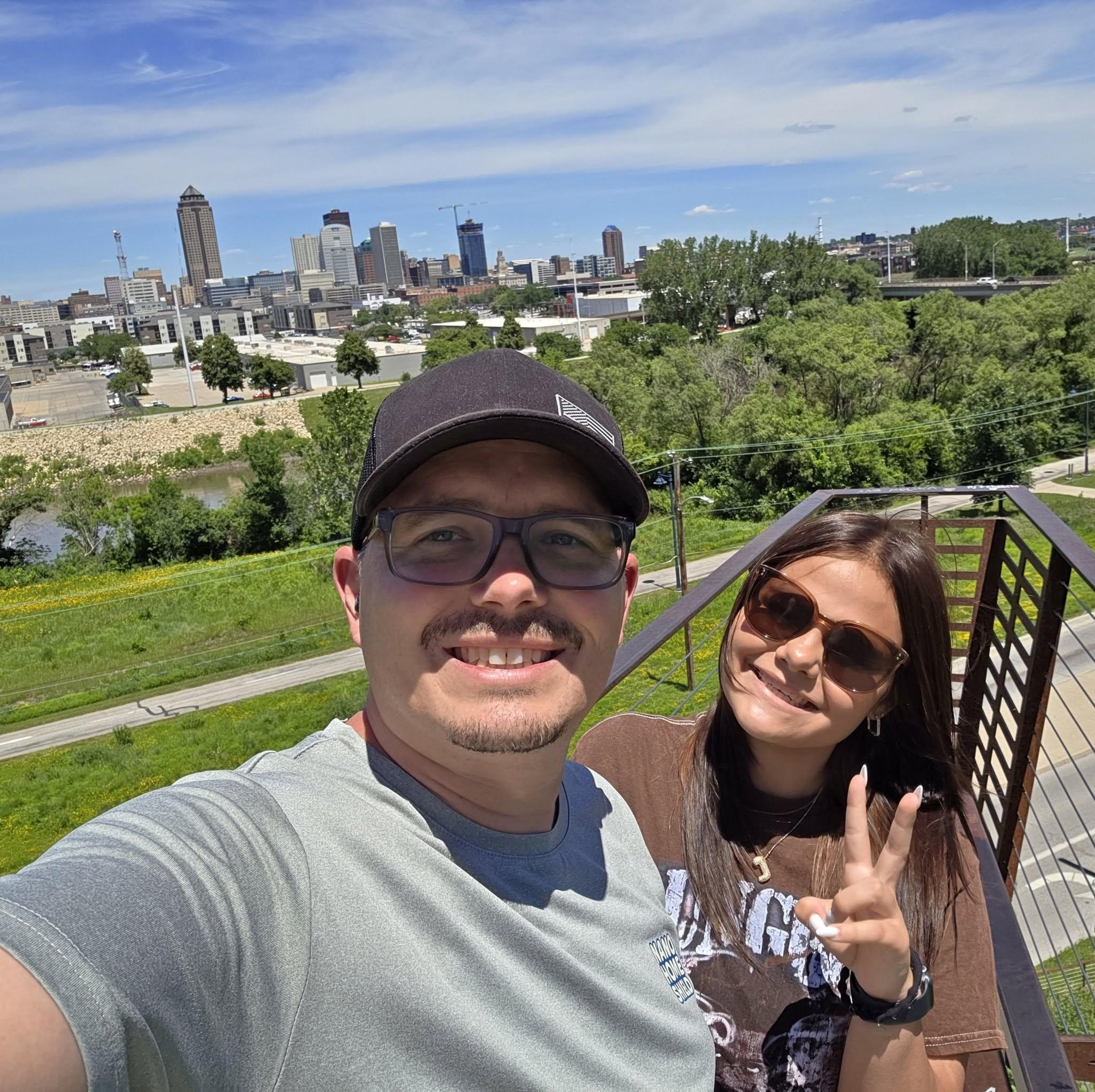 Keith Lucas, owner of Nano Home Shield, with the Des Moines skyline behind him
