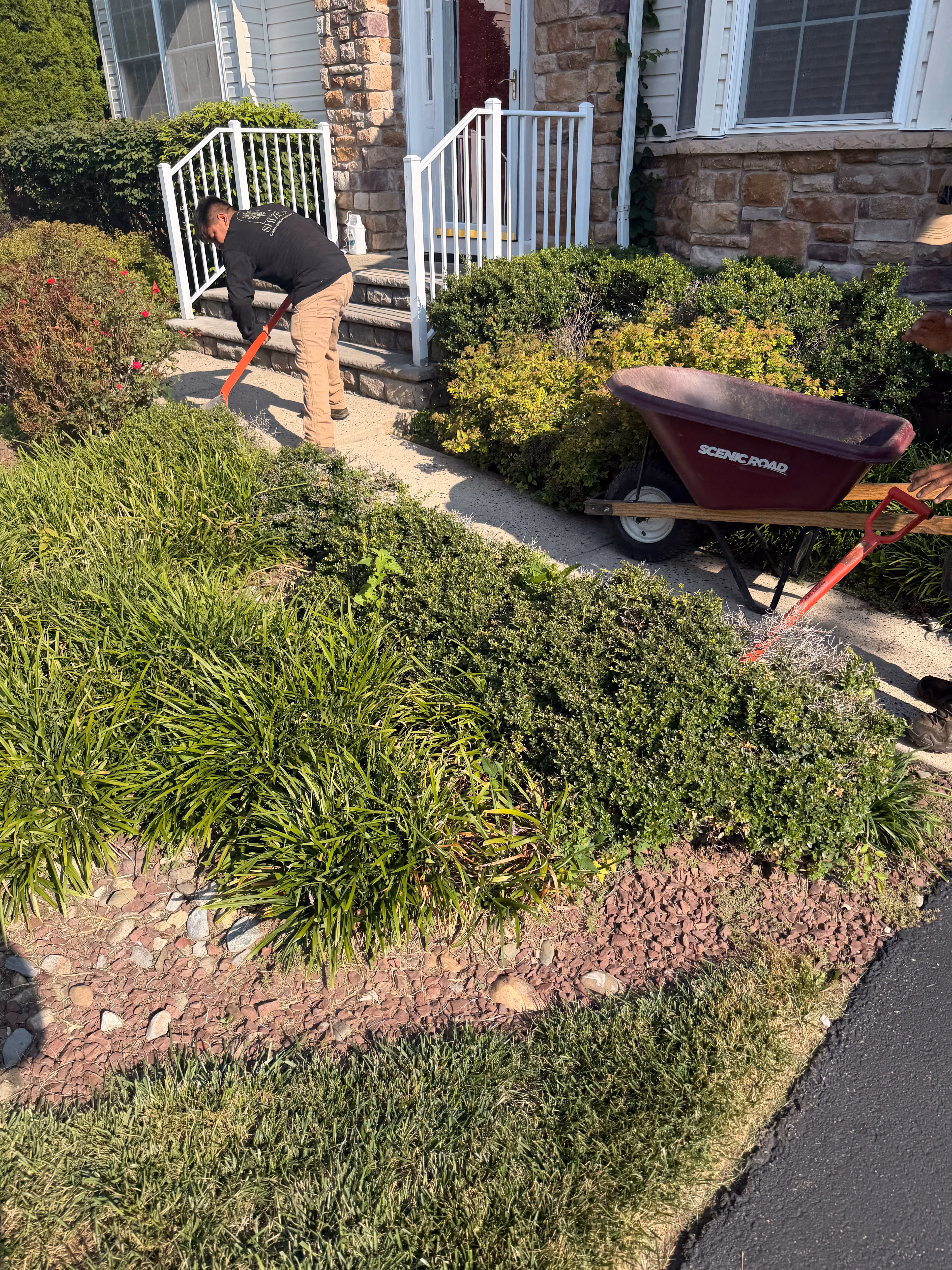 Old Shrubs Out, Clean Stone Garden Bed In