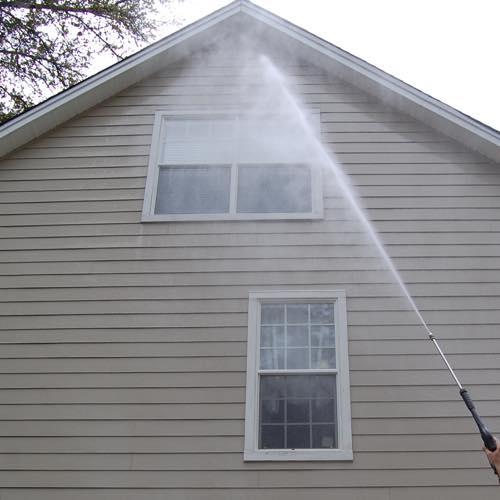 Clean residential exterior after soft wash (feature photo)