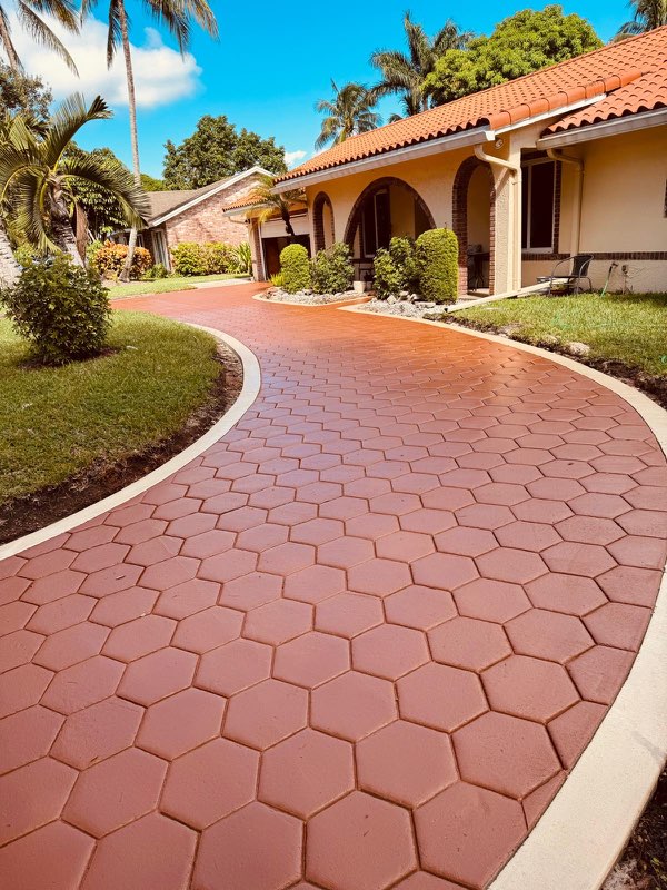 Beautiful and Affordable Stamped Concrete by Castilla Concrete Finish Design Corp team in Sunrise, FL - people or person