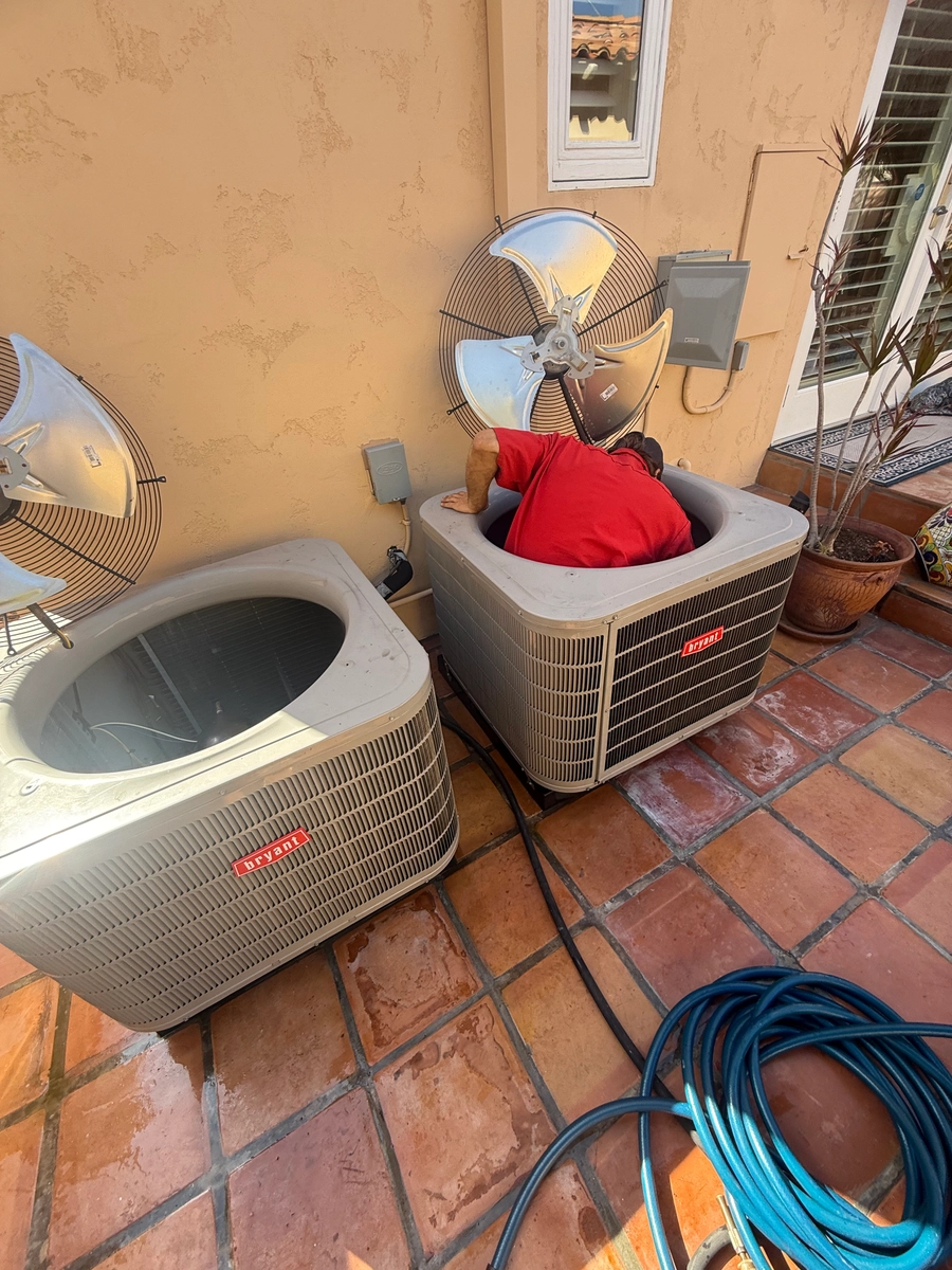 Heating system maintenance at a San Diego, CA property by BY THE BOOK Plumbing • Heating • Air Conditioning