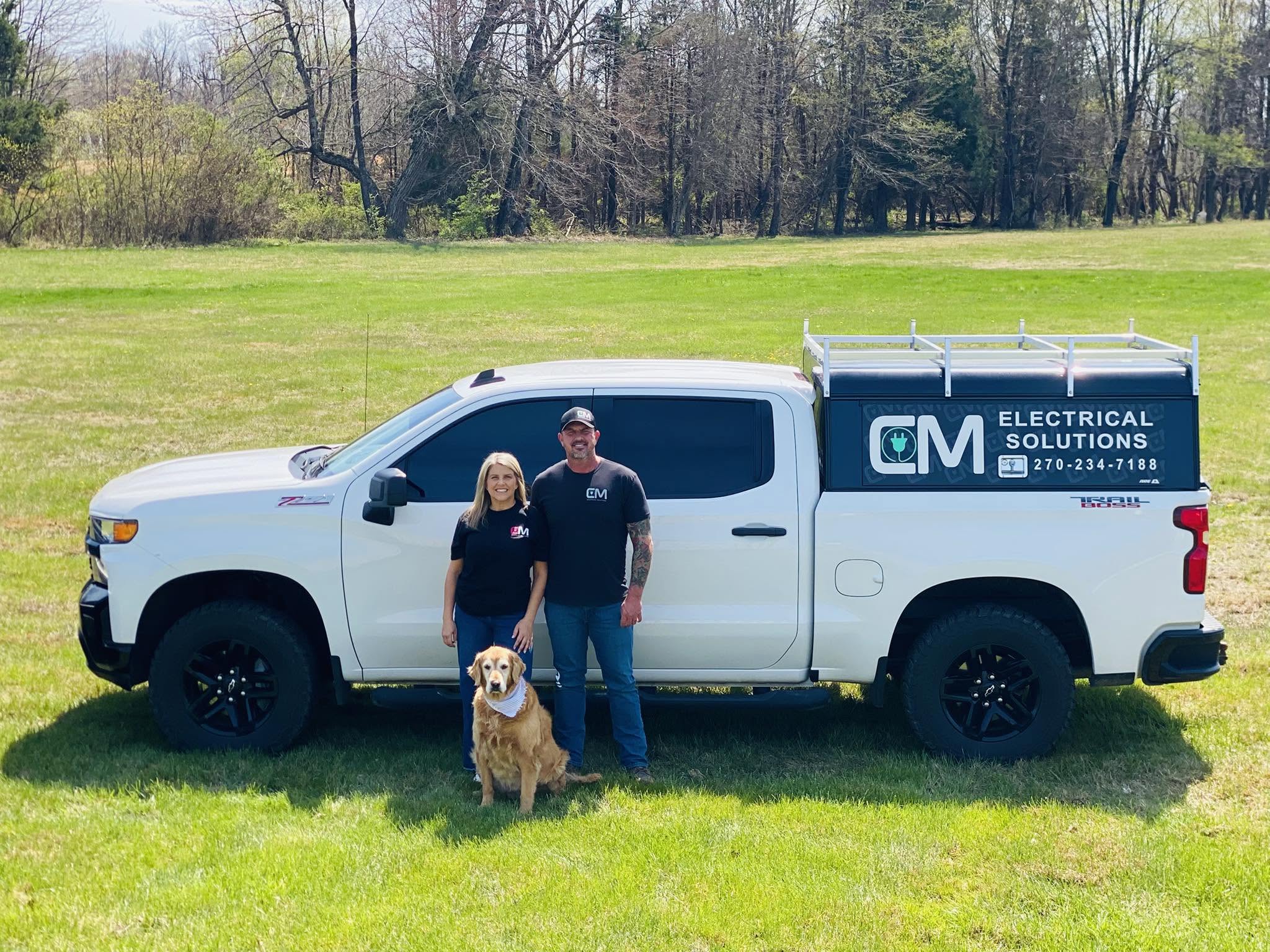 CM Electrical Solutions team with their work truck