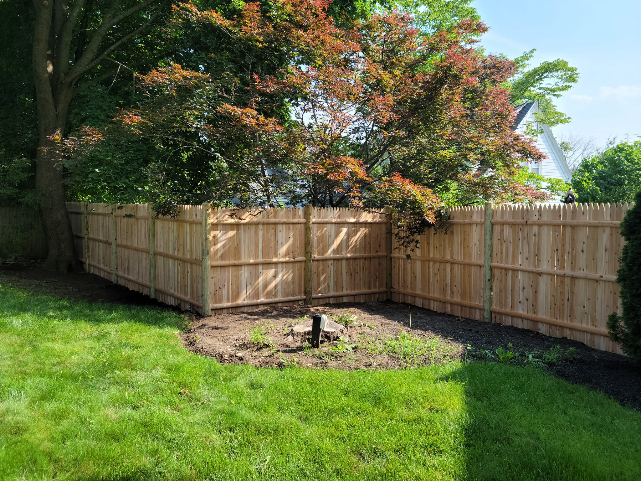 wood, chain-link, vinyl and aluminum fencing installation company Azorean Fence in Peabody, MA