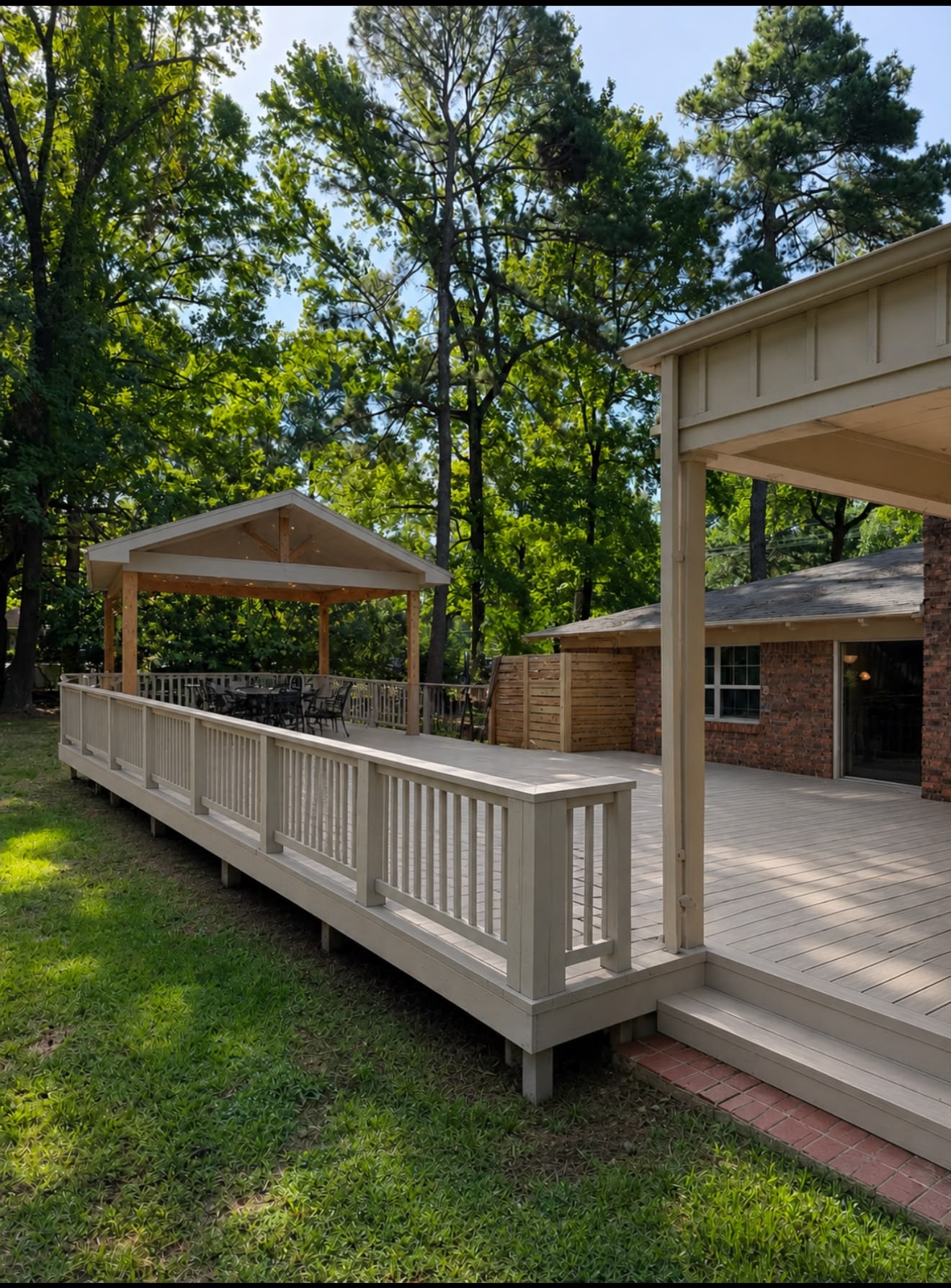 Wood deck with attached pergola in Texarkana, TX