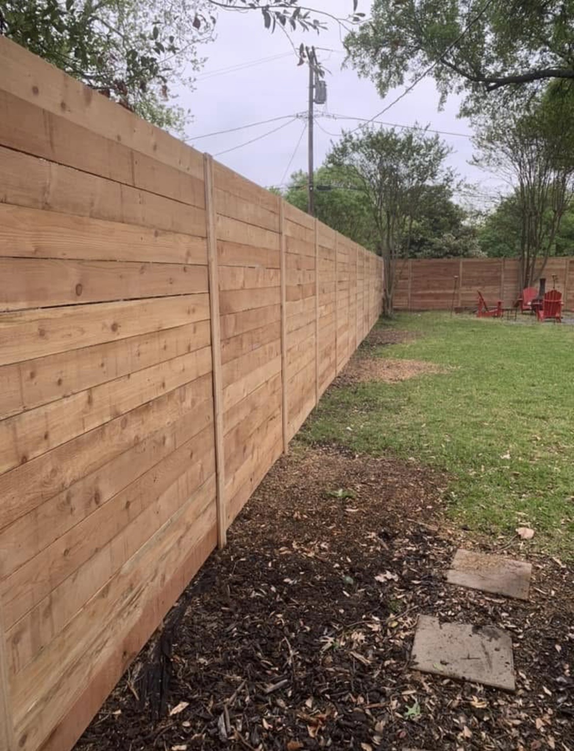 Modern horizontal-plank cedar fence in Texarkana, TX