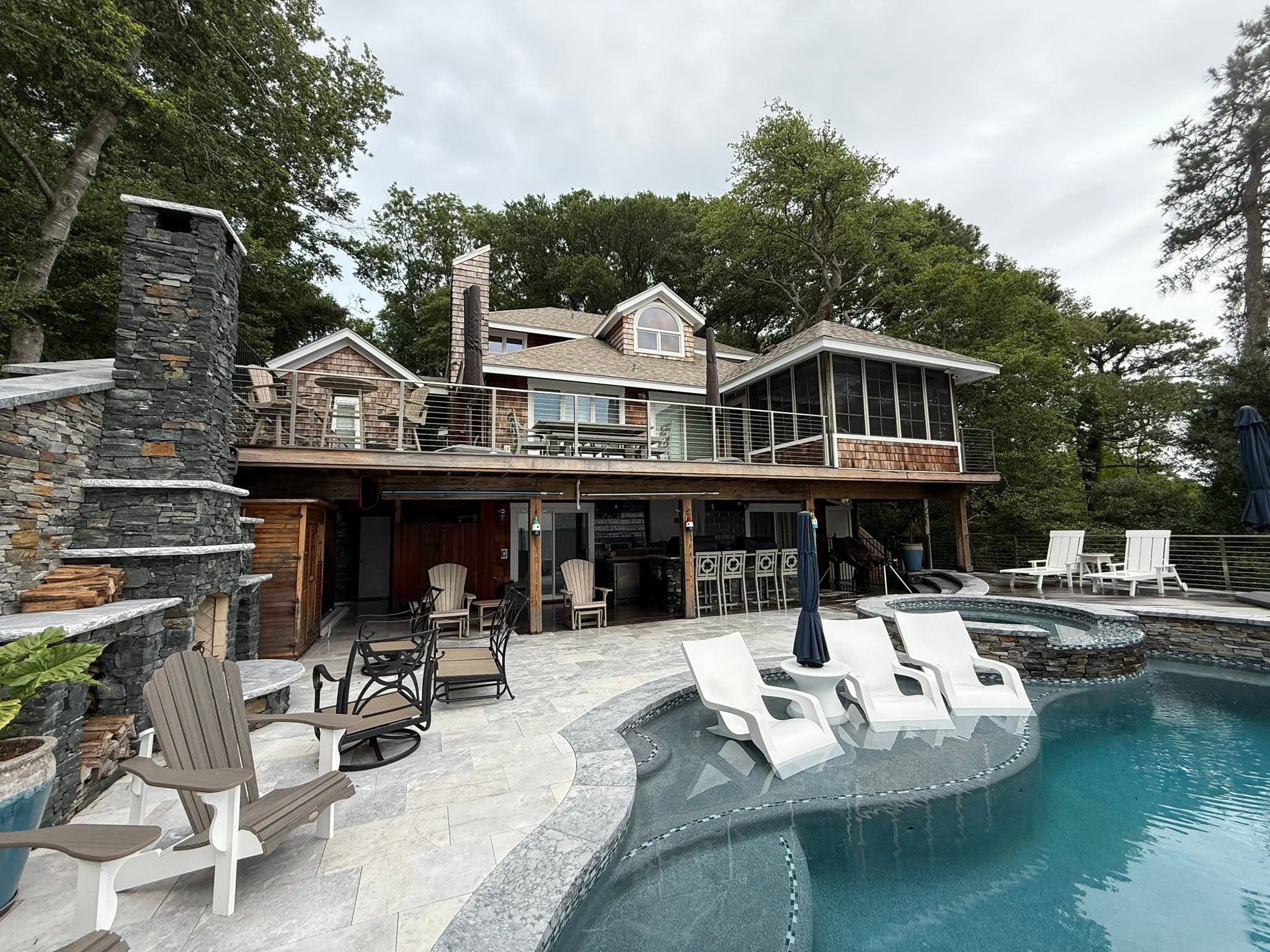 Cedar shake home with pool patio in the Outer Banks after paver cleaning and sealing