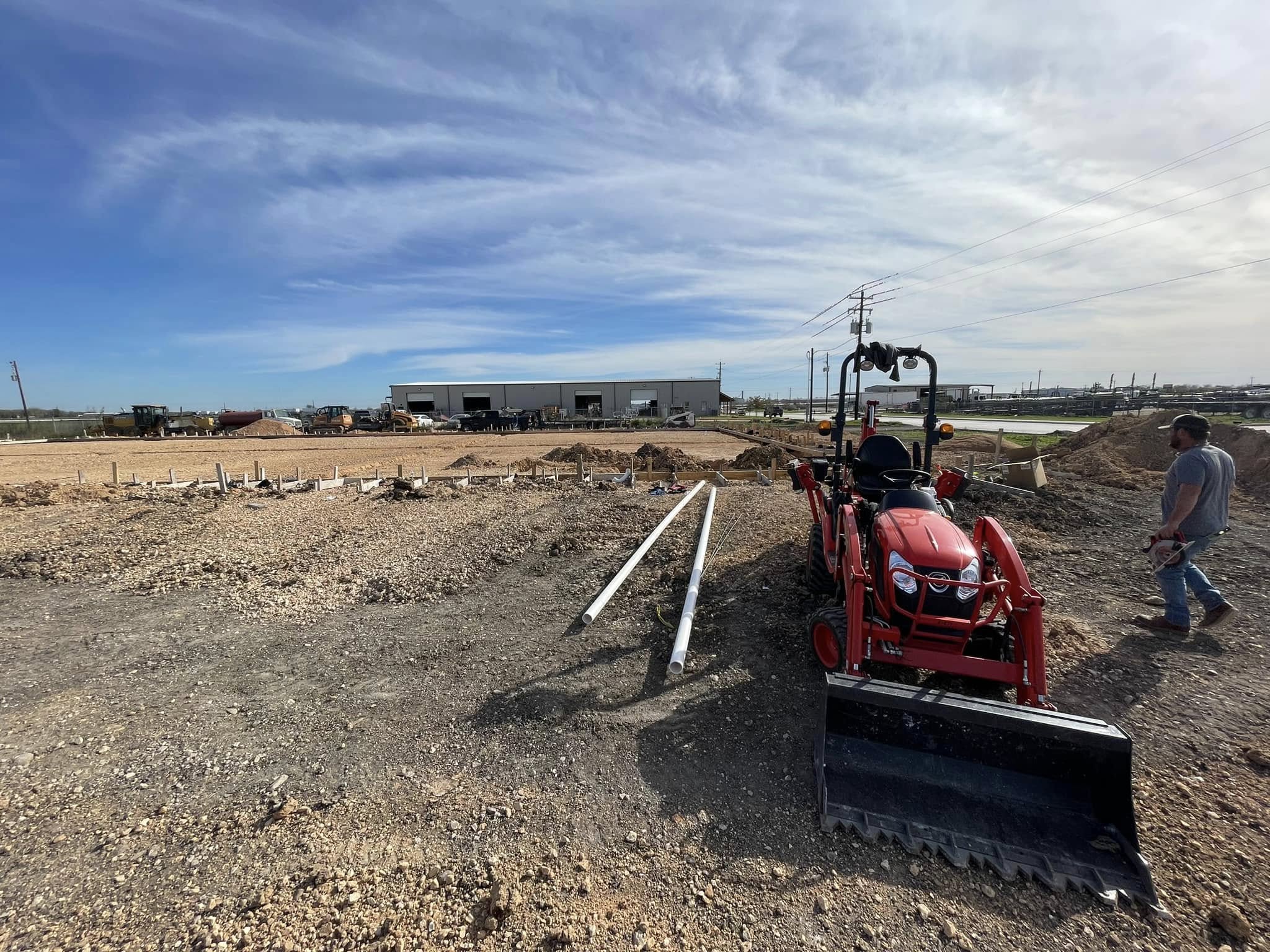 Underground sewer and water rough in on a commercial site
