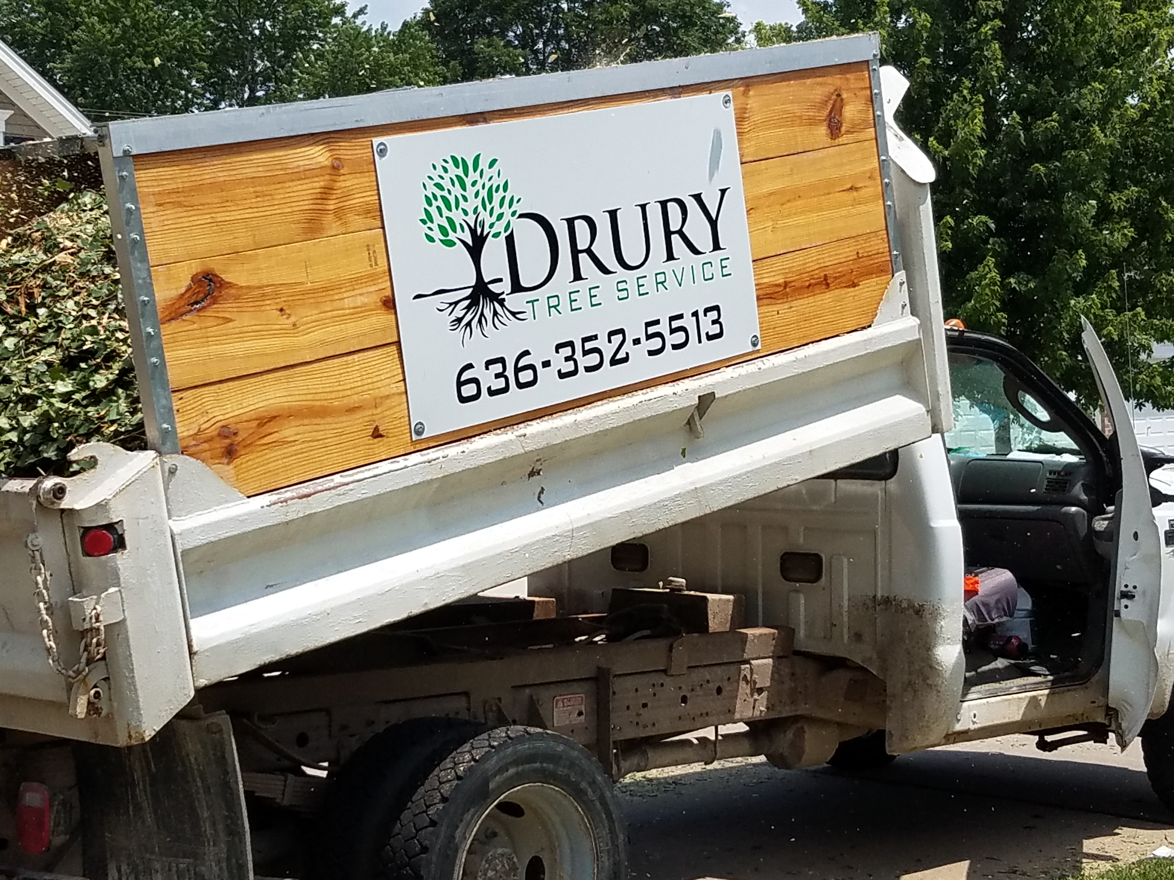 Drury Tree Service dump truck with wooden bed sides