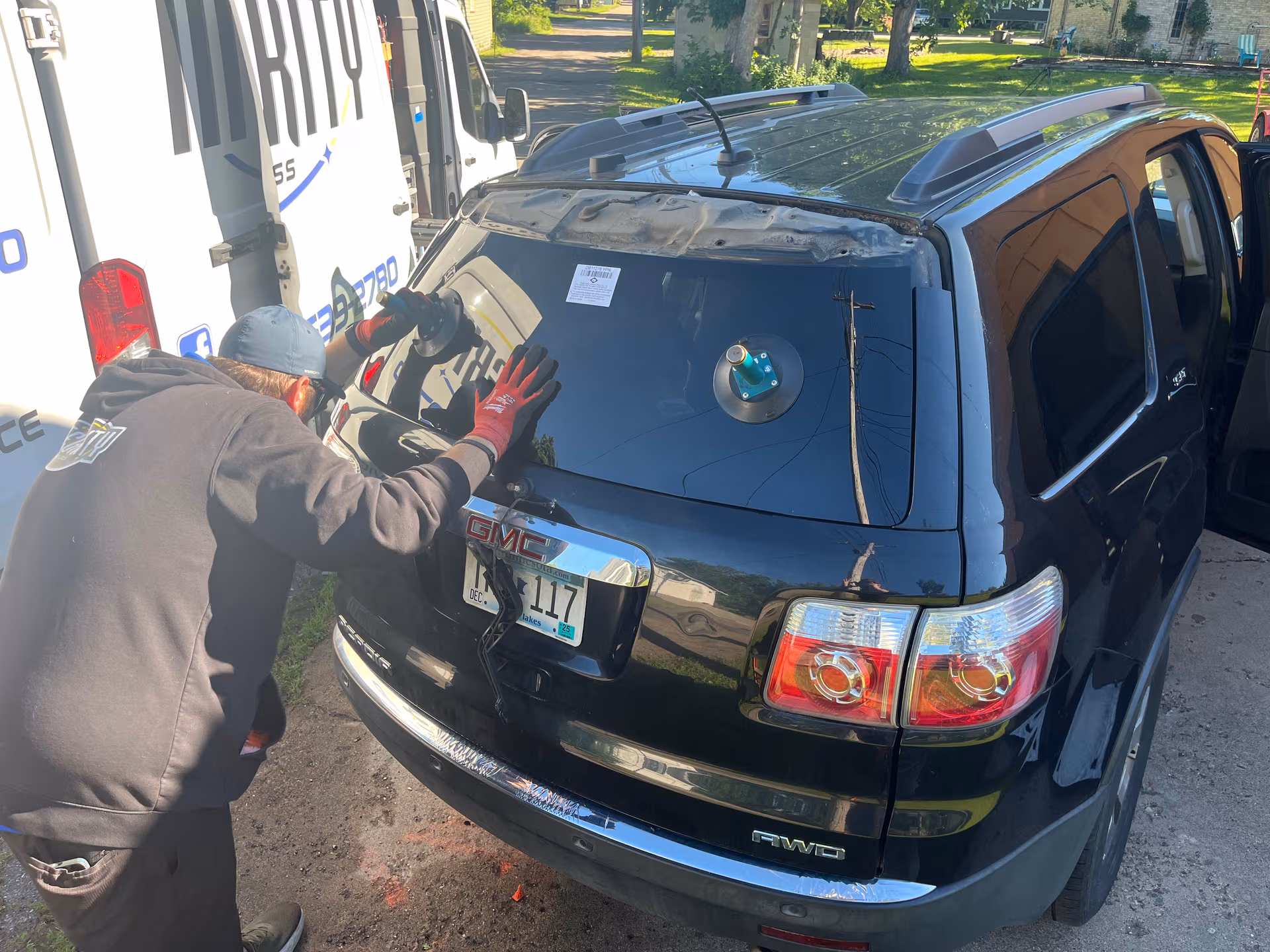 We Gave Back with a Free Back Glass Replacement on a GMC Acadia
