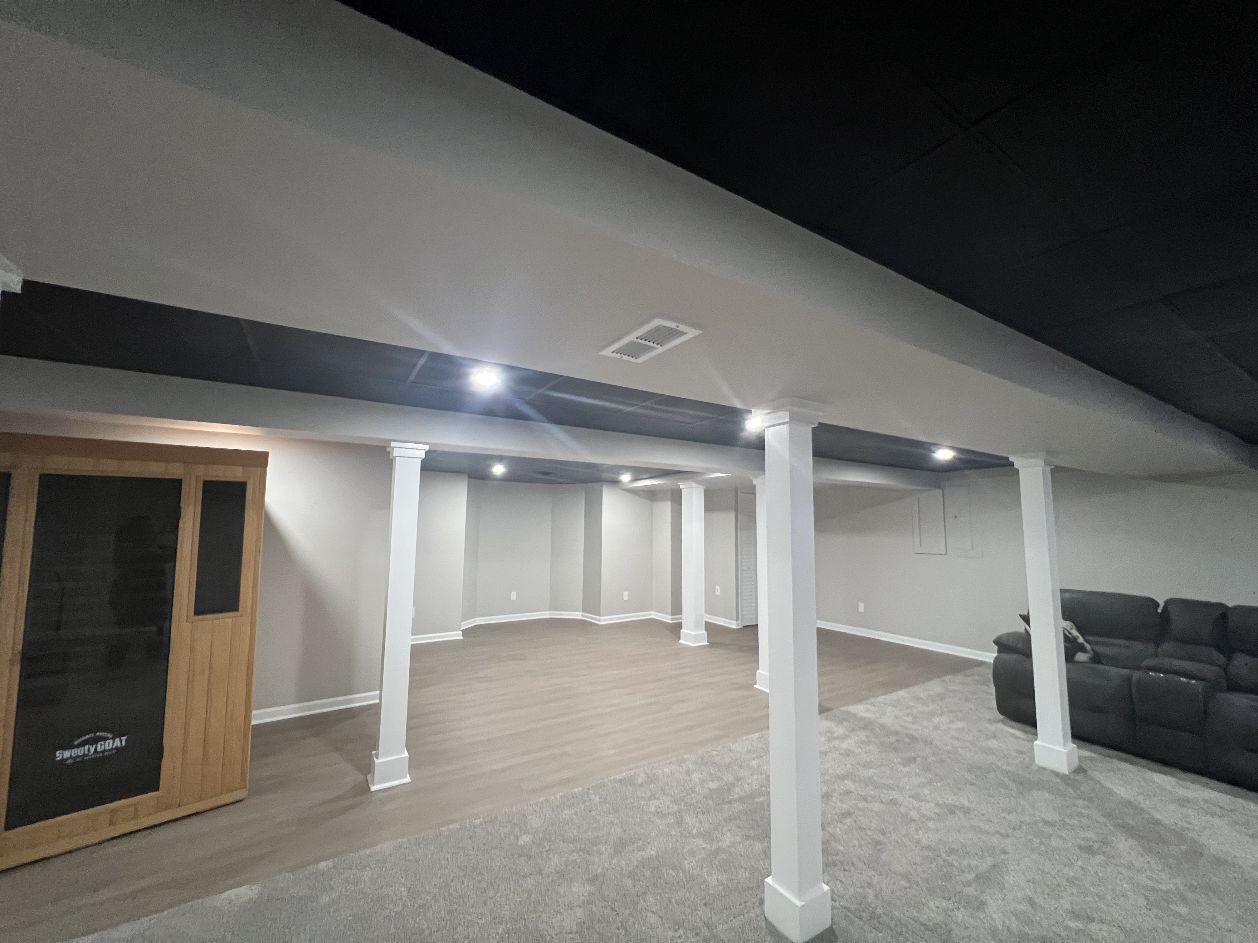 Mitten Made basement flooring and trim finish work