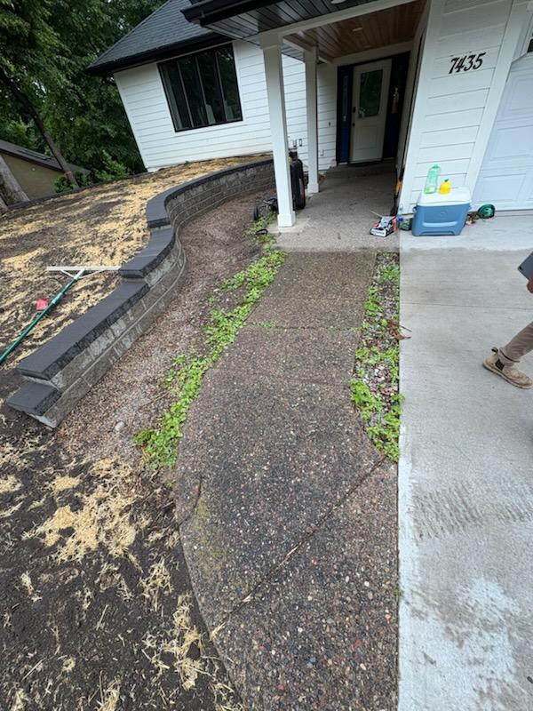 The entryway at a Wright County home before Precision Masonry poured the new concrete.