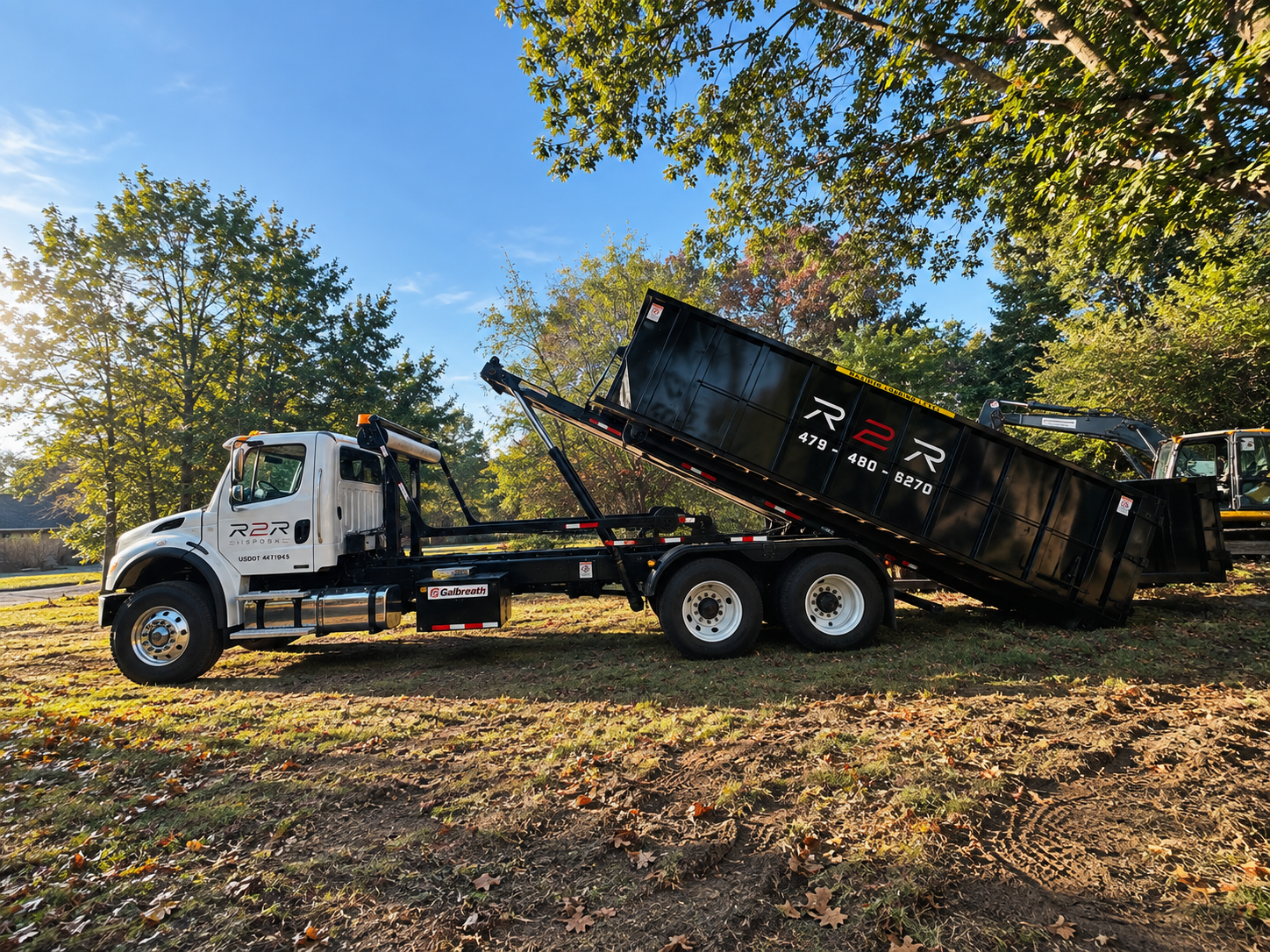 R2R roll-off dumpster delivered and set for a Northwest Arkansas project
