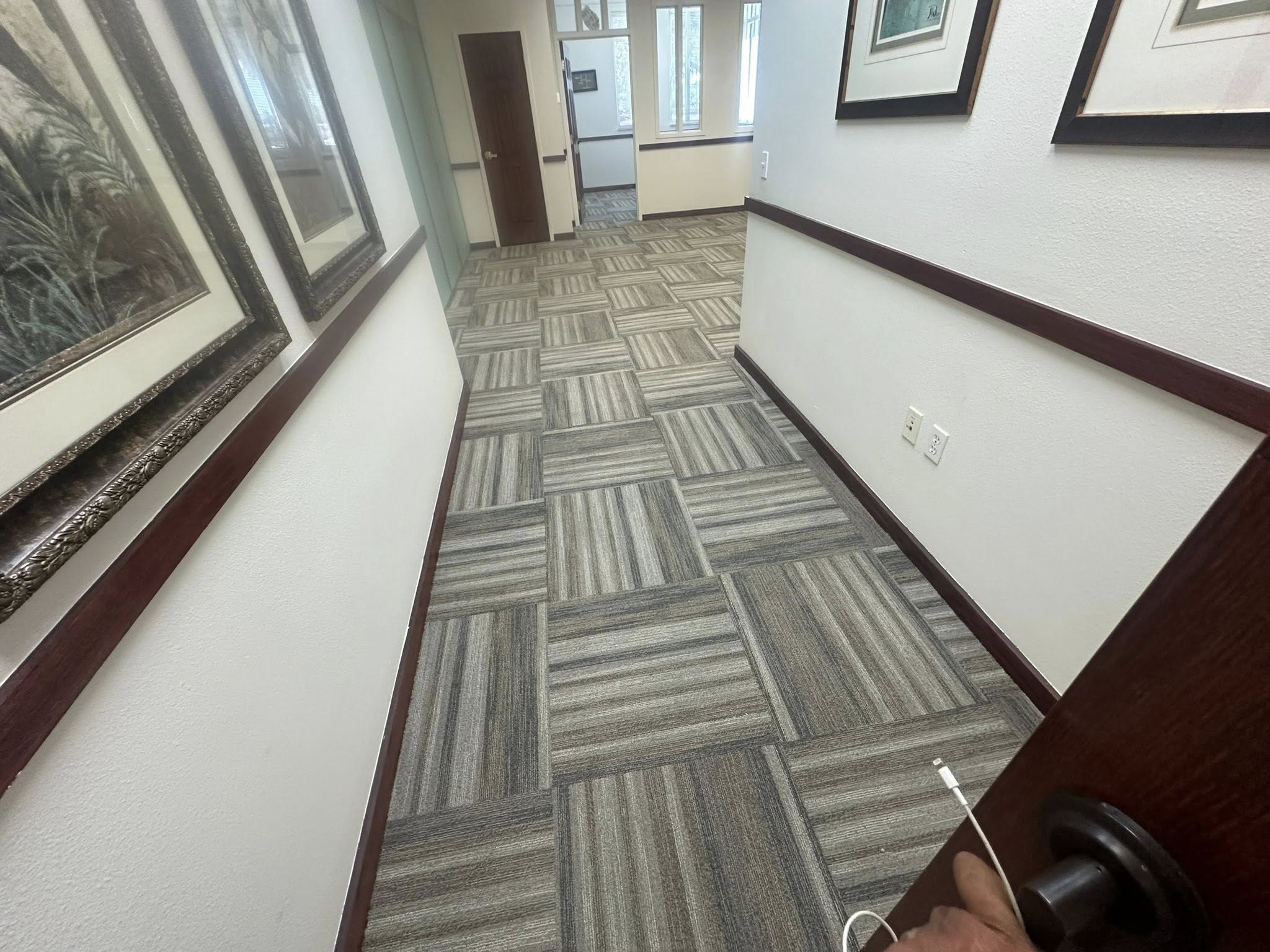 Office corridor in Tampa, FL with new commercial carpet tile