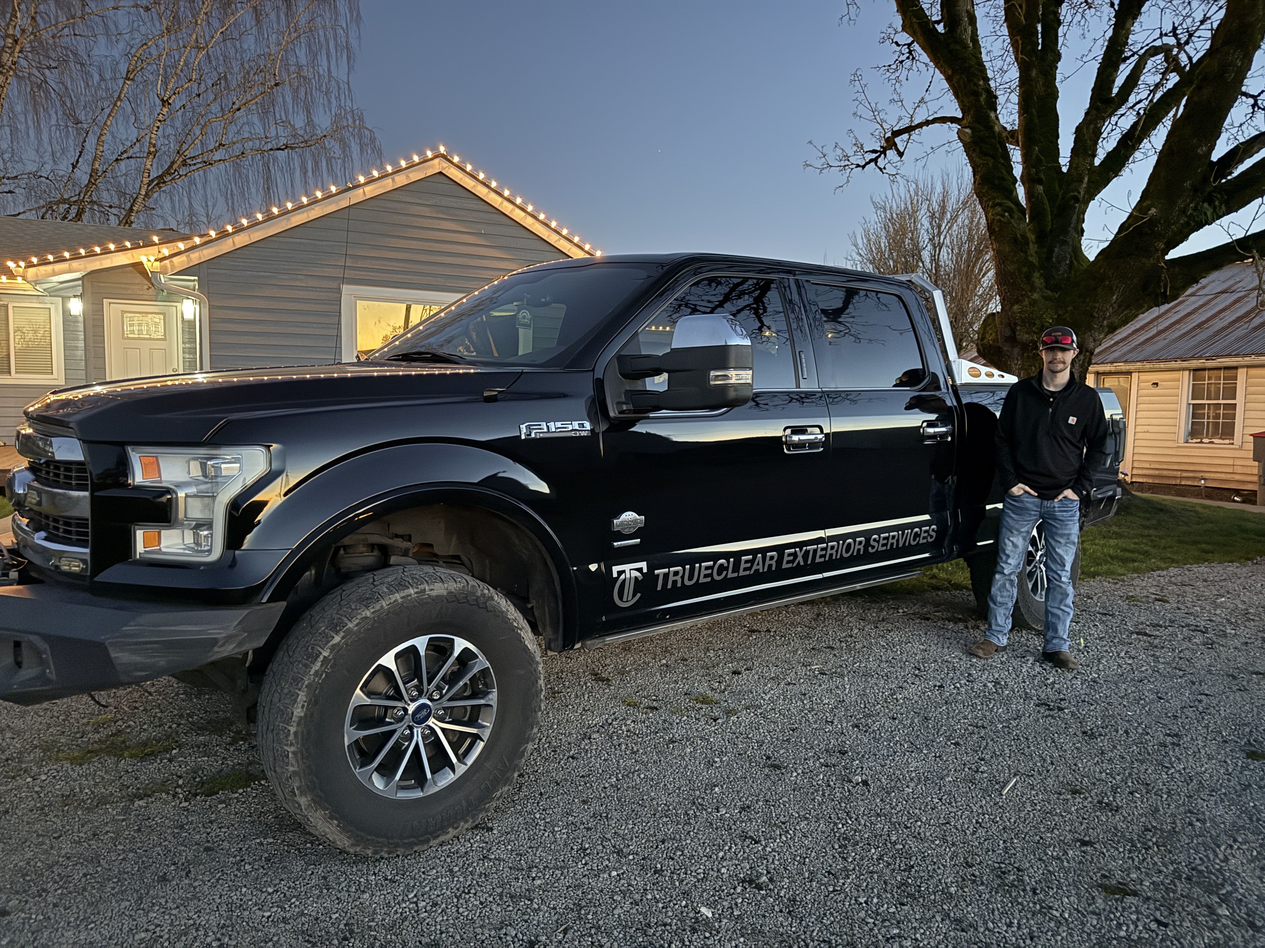Hayden Nagel, owner of TrueClear Exterior Services, with the TrueClear truck