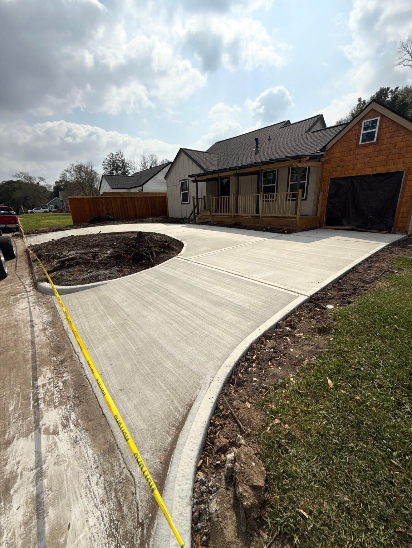New concrete walkway and driveway at a Pearland home