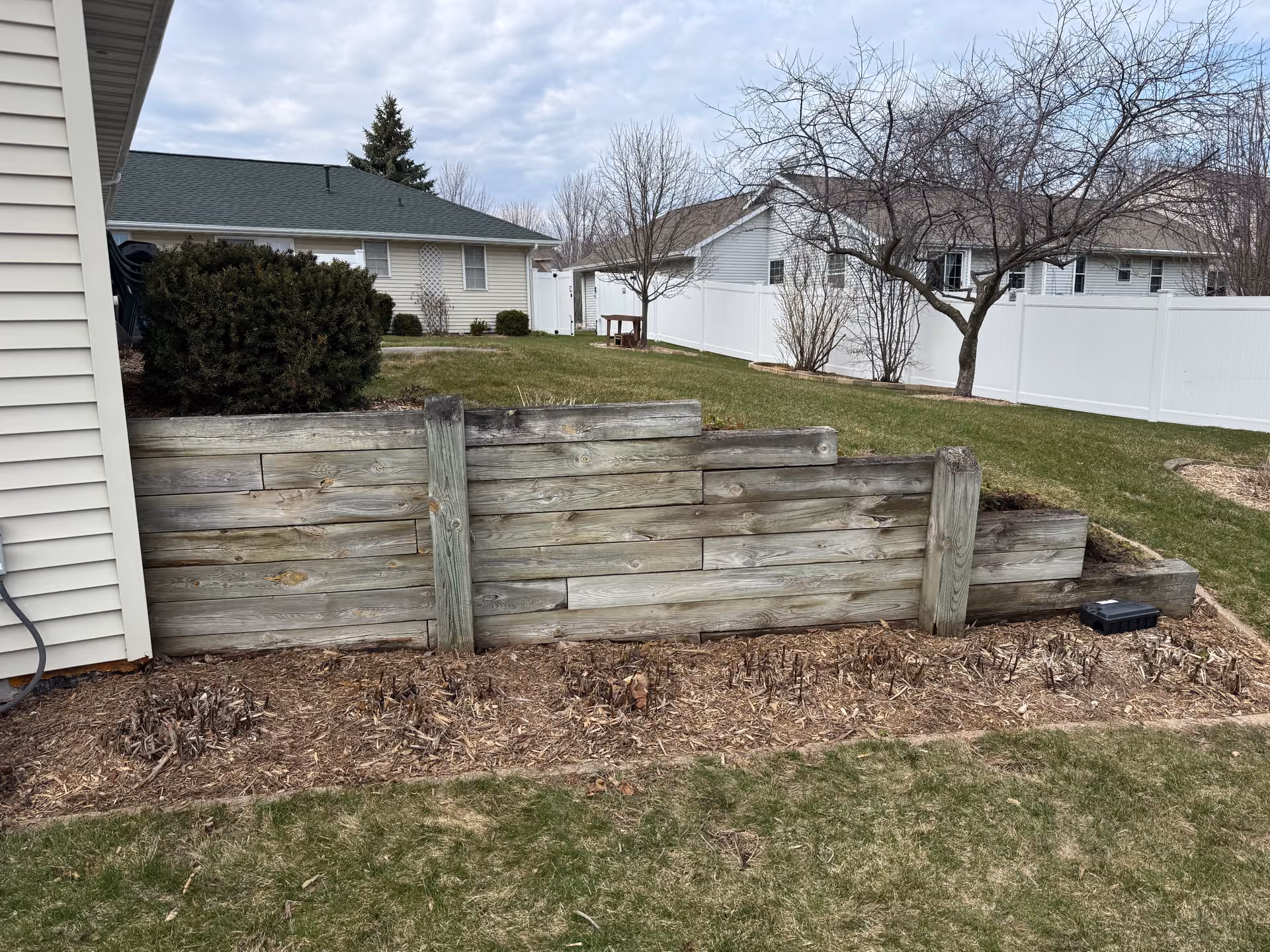 Old Timber Retaining Wall Replaced with Solid Stone