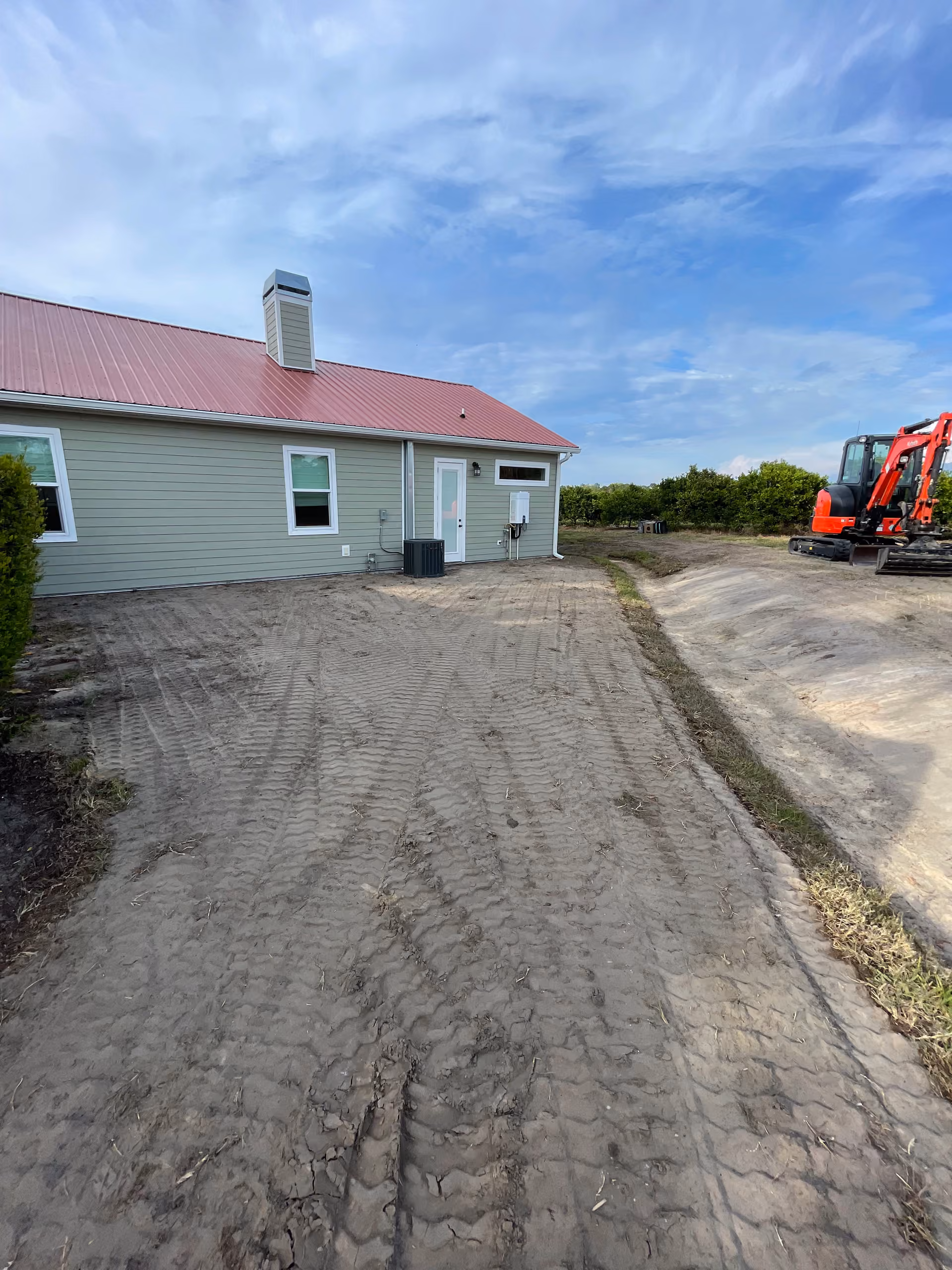 Final Grade Correction and Drainage Fix After Home Addition