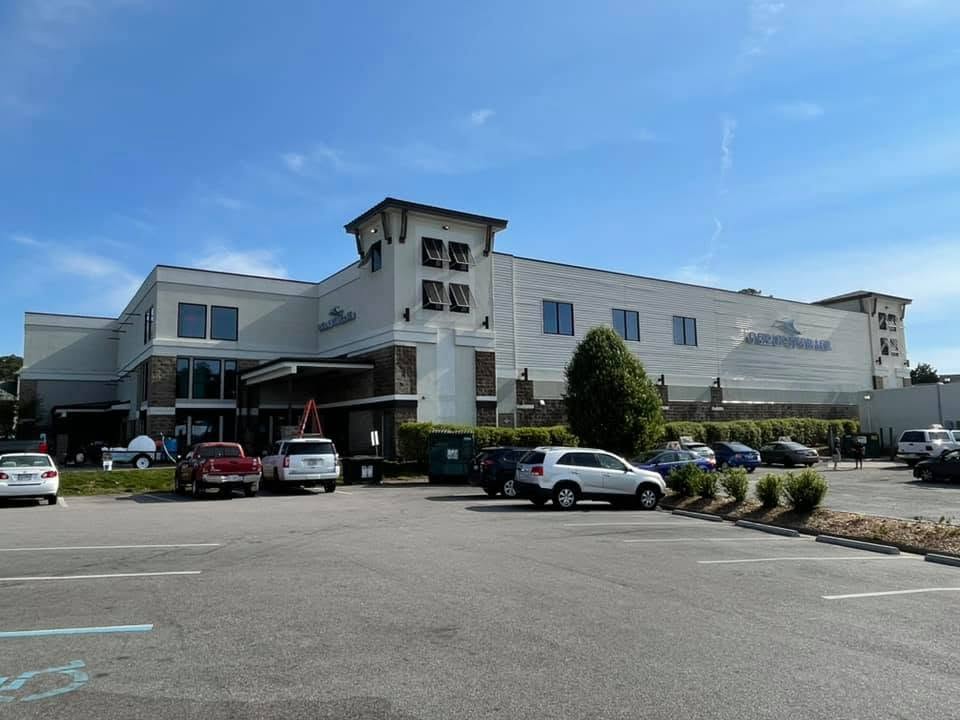 Commercial pressure washing, Outer Banks NC storefront and parking lot